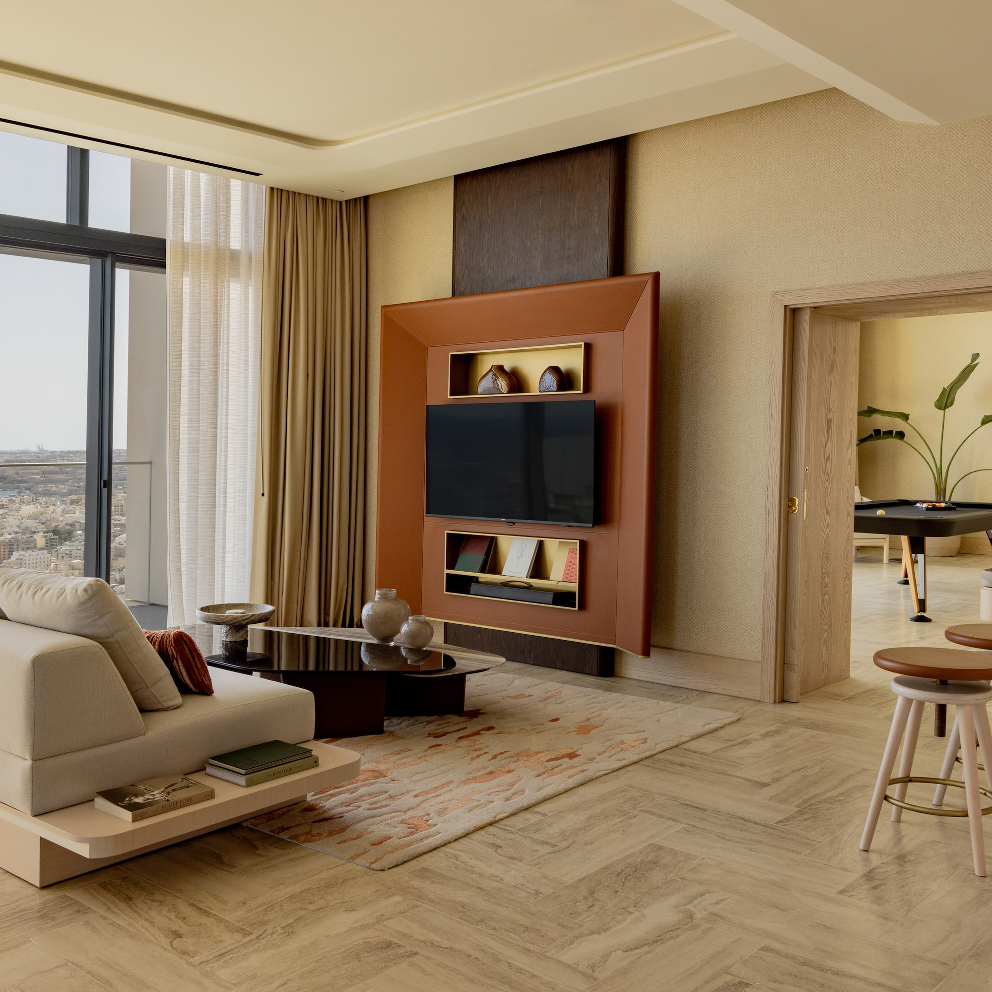 a living room with a tv and a table