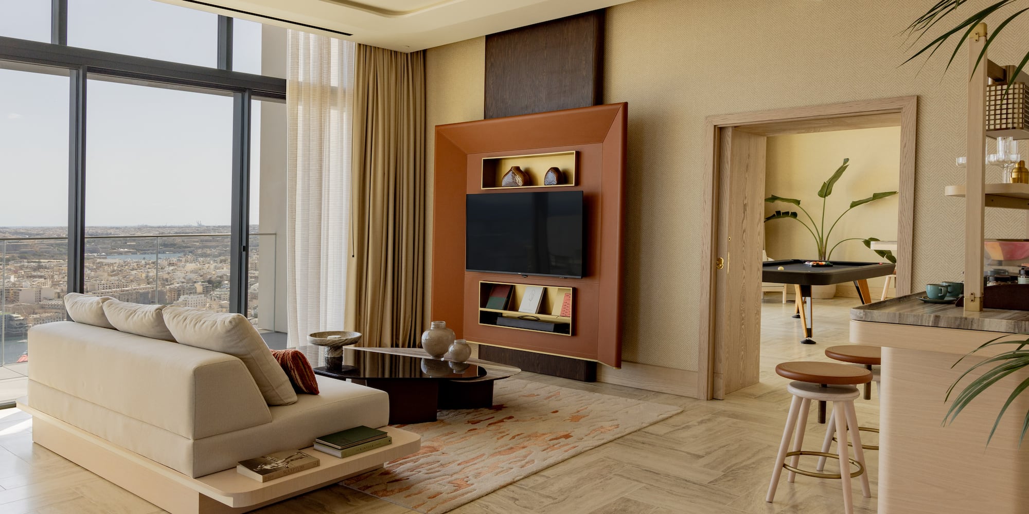 a living room with a tv and a table