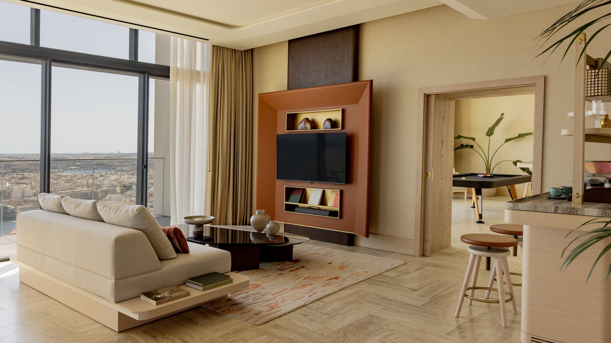 a living room with a tv and a table