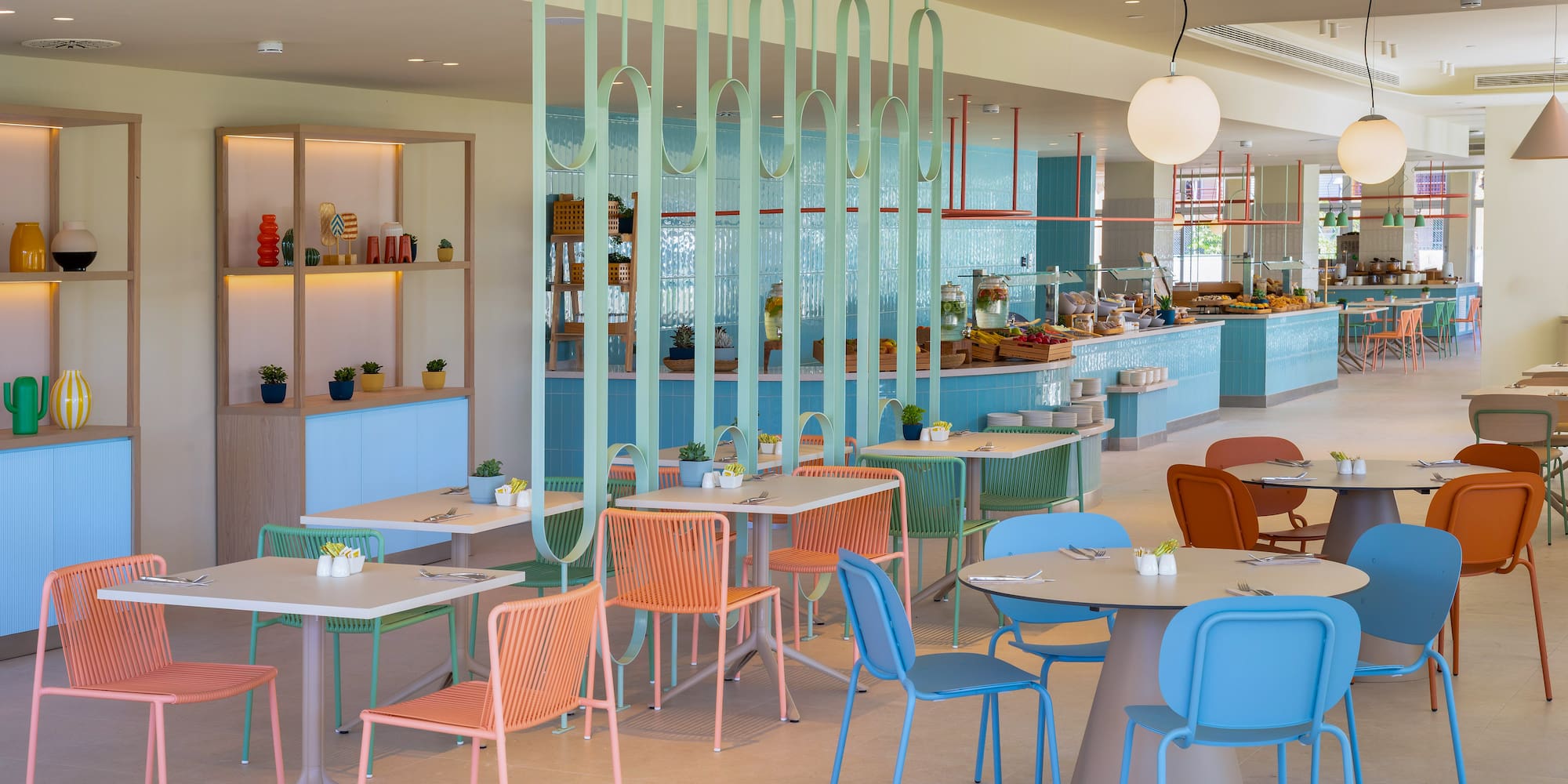 a restaurant with tables and chairs