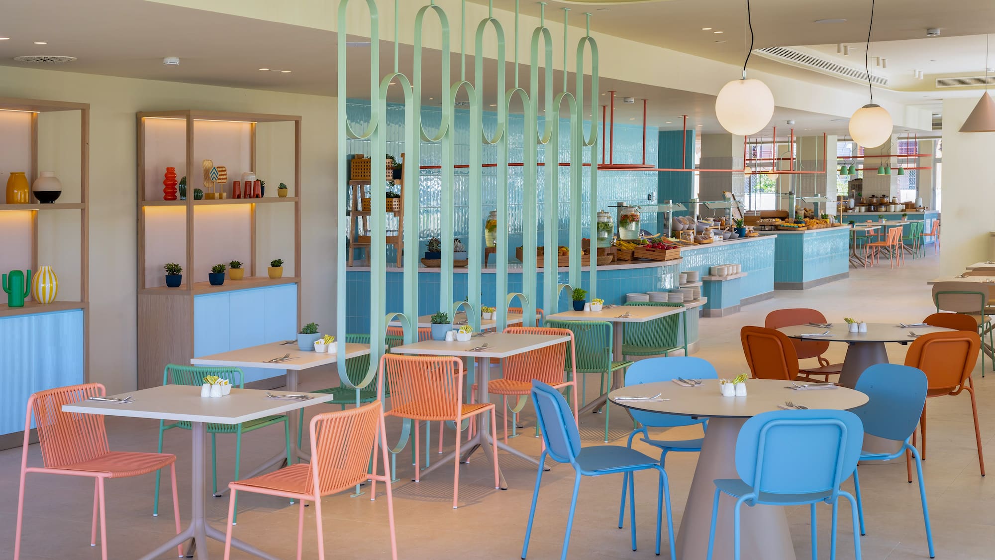 a restaurant with tables and chairs