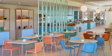 a restaurant with tables and chairs