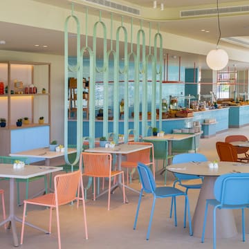 a restaurant with tables and chairs