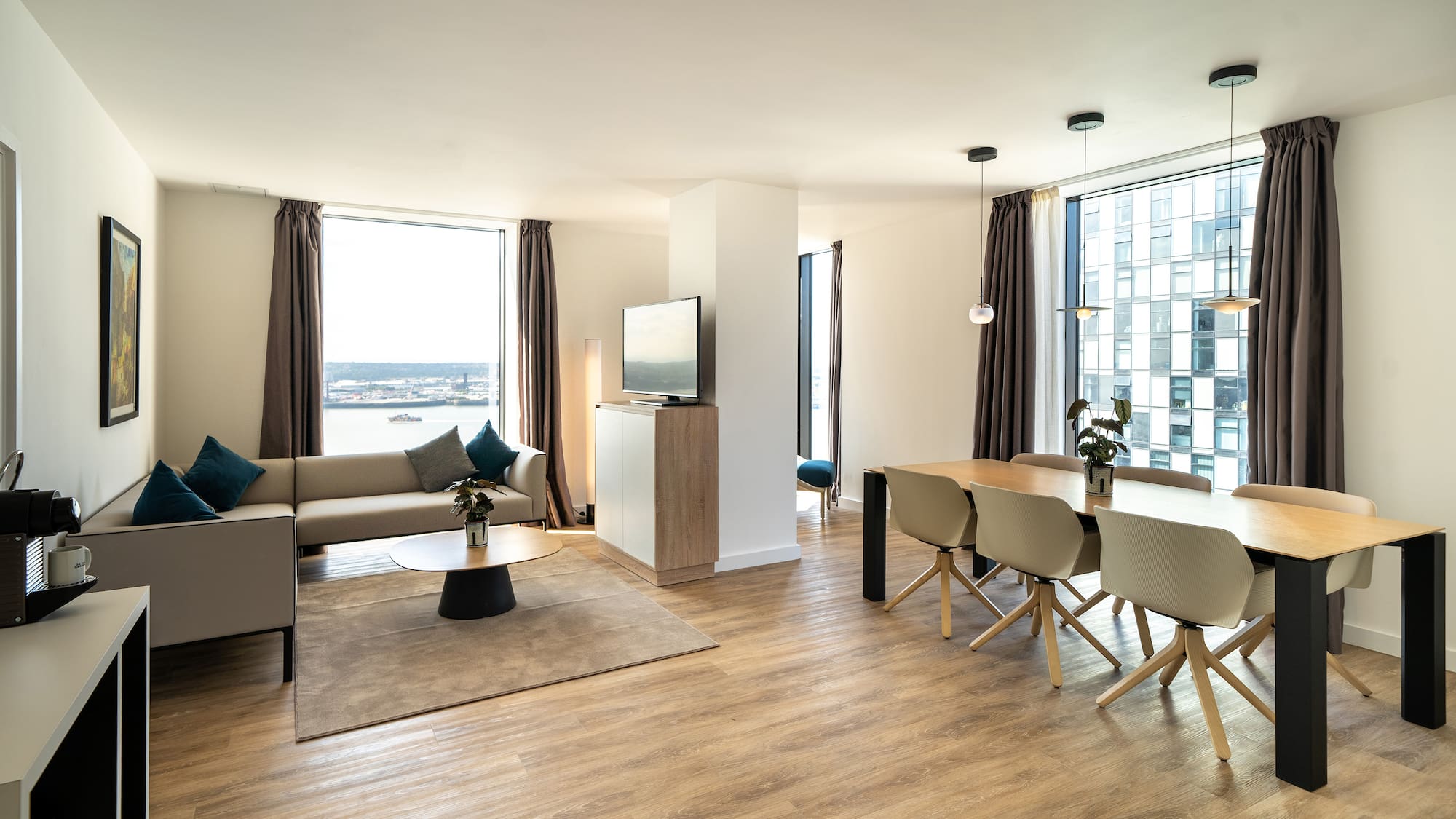 a room with a table and chairs