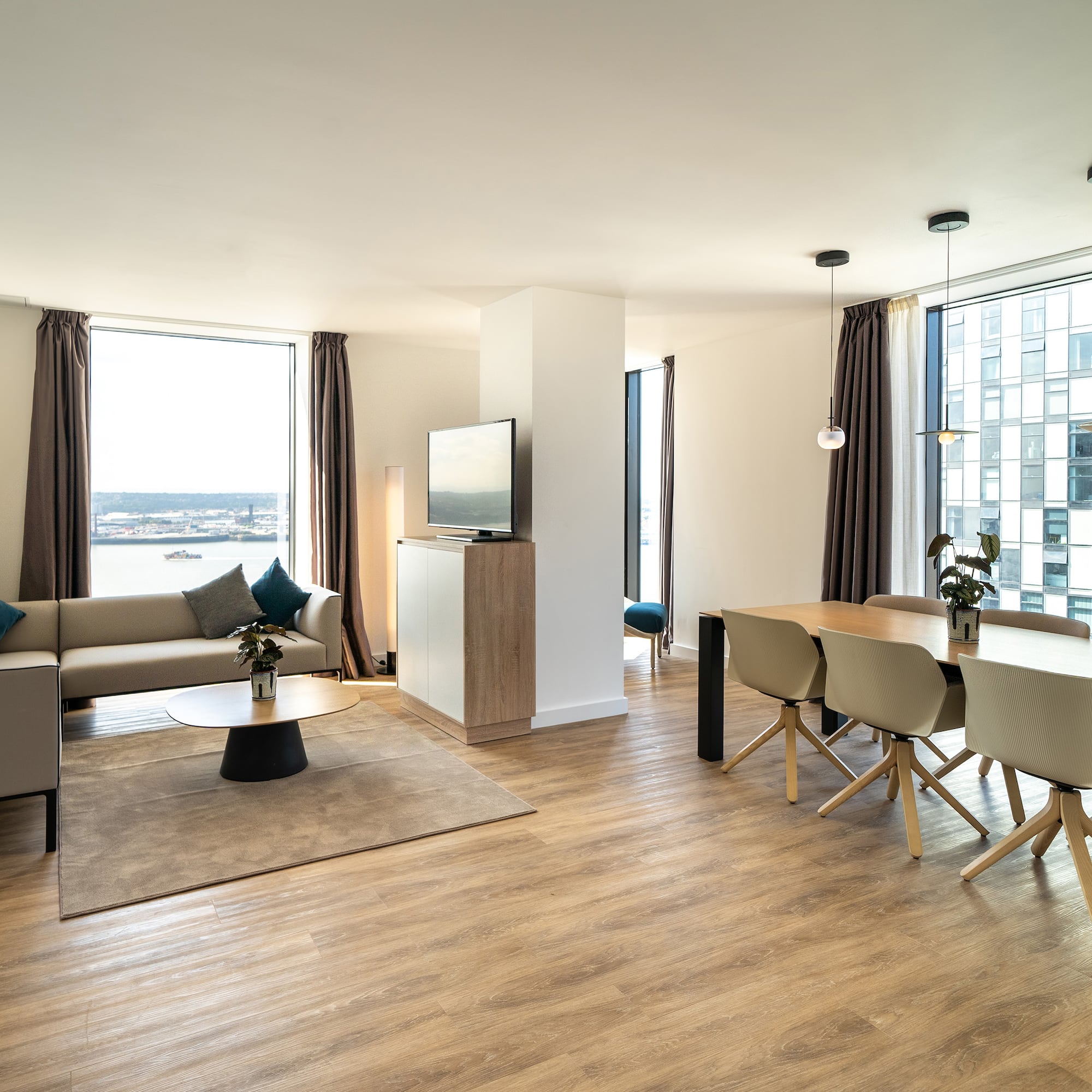 a room with a table and chairs