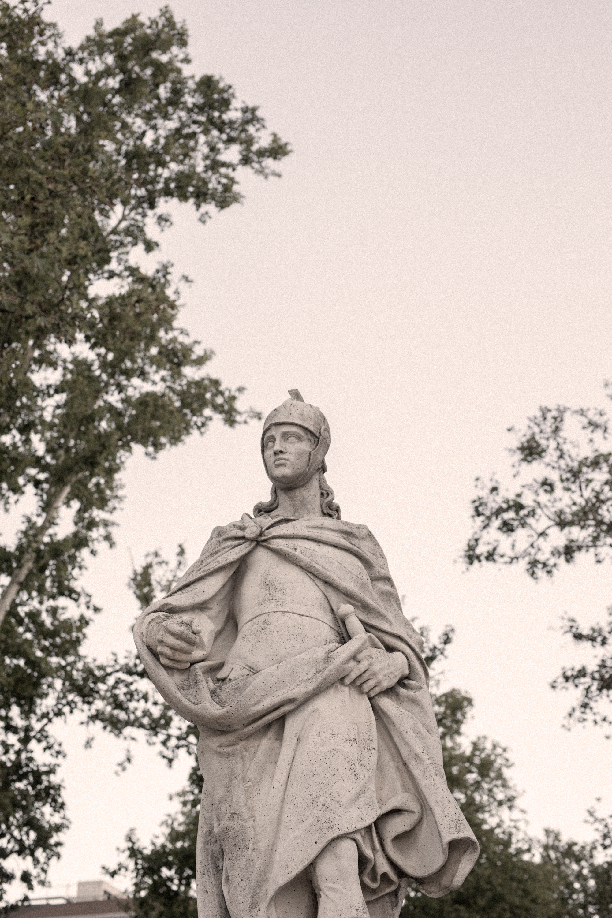 a statue of a man in a helmet and a helmet