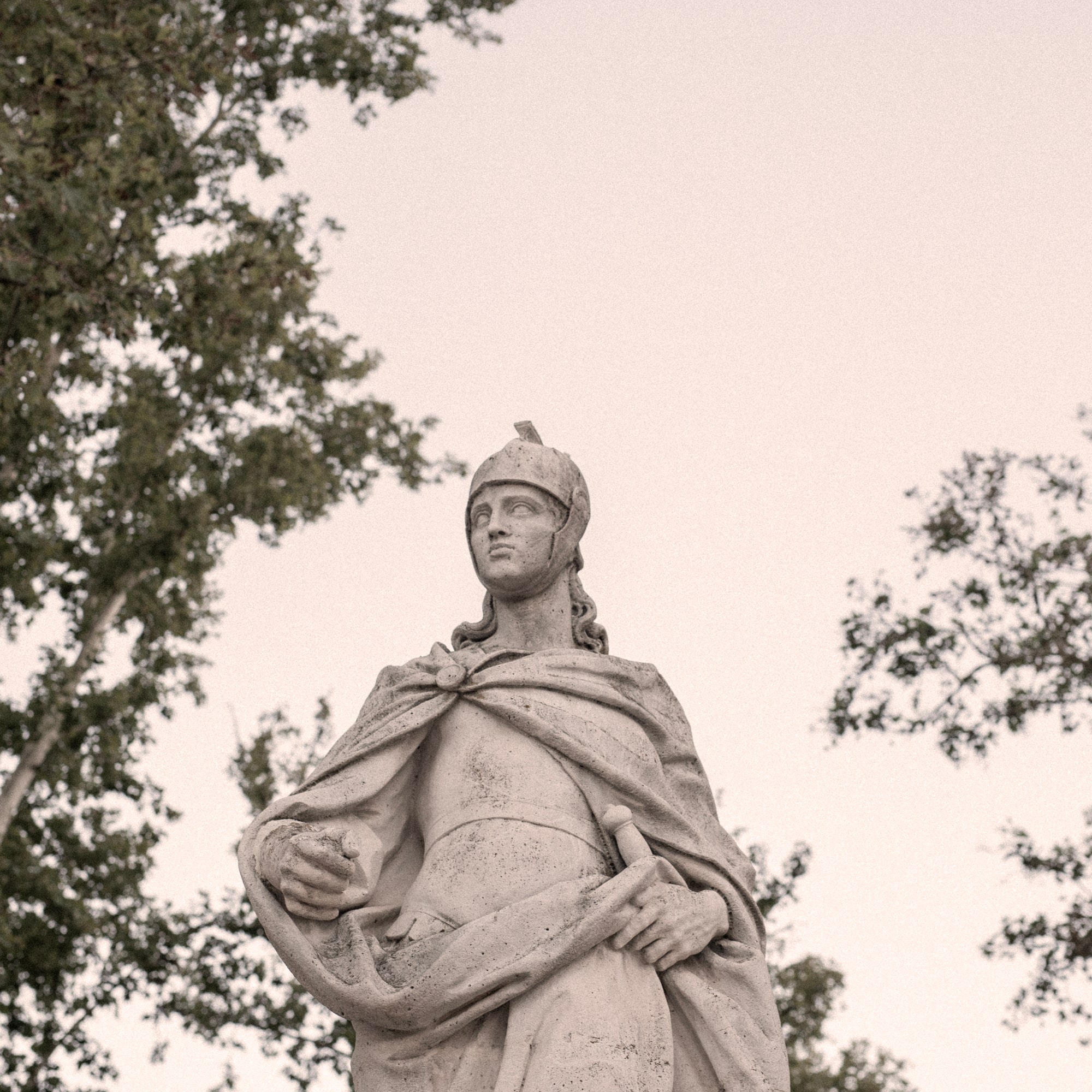 a statue of a man in a helmet and a helmet