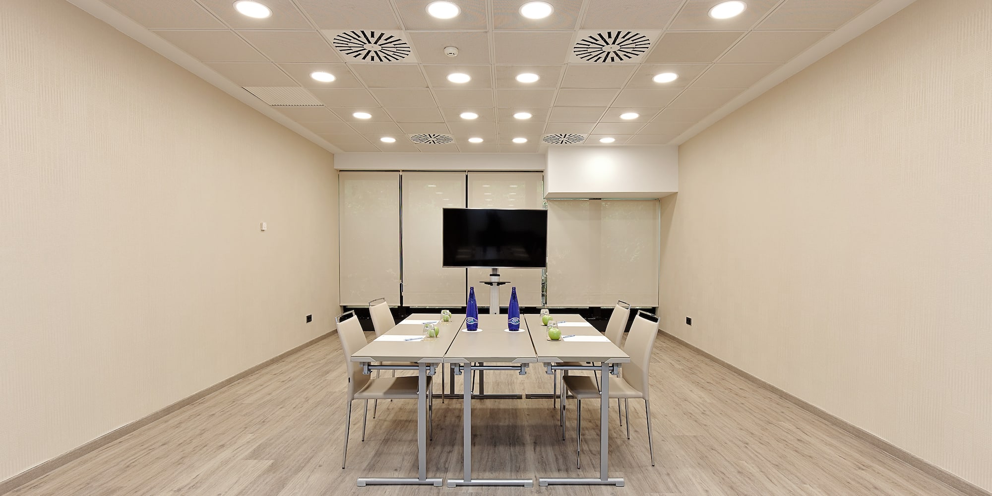 a room with a table and chairs