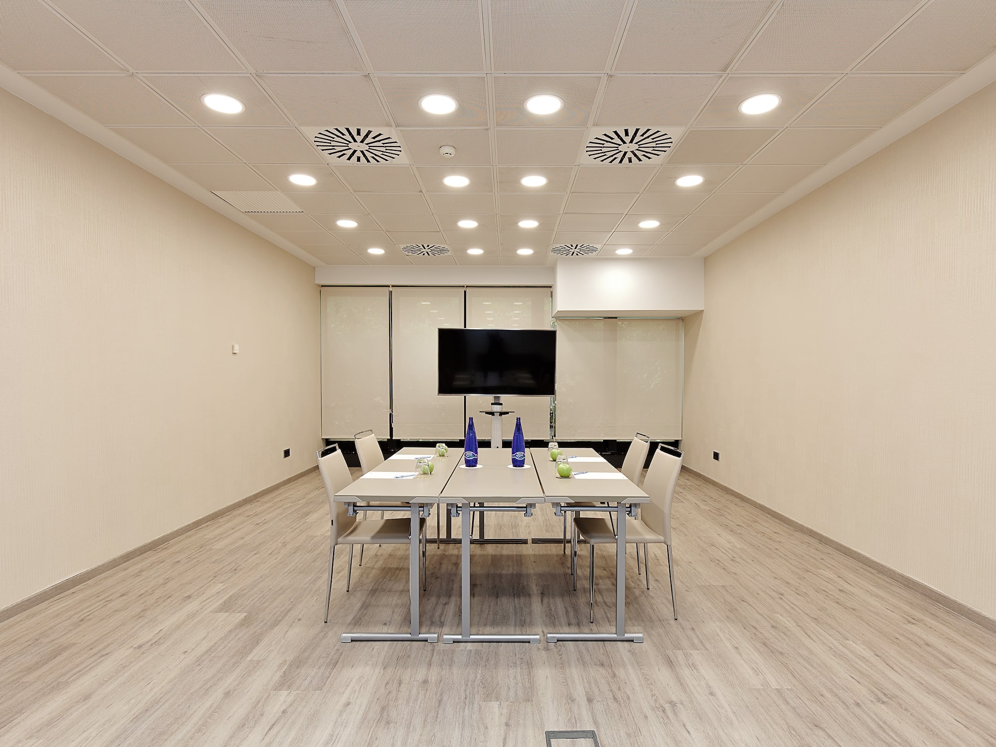 a room with a table and chairs