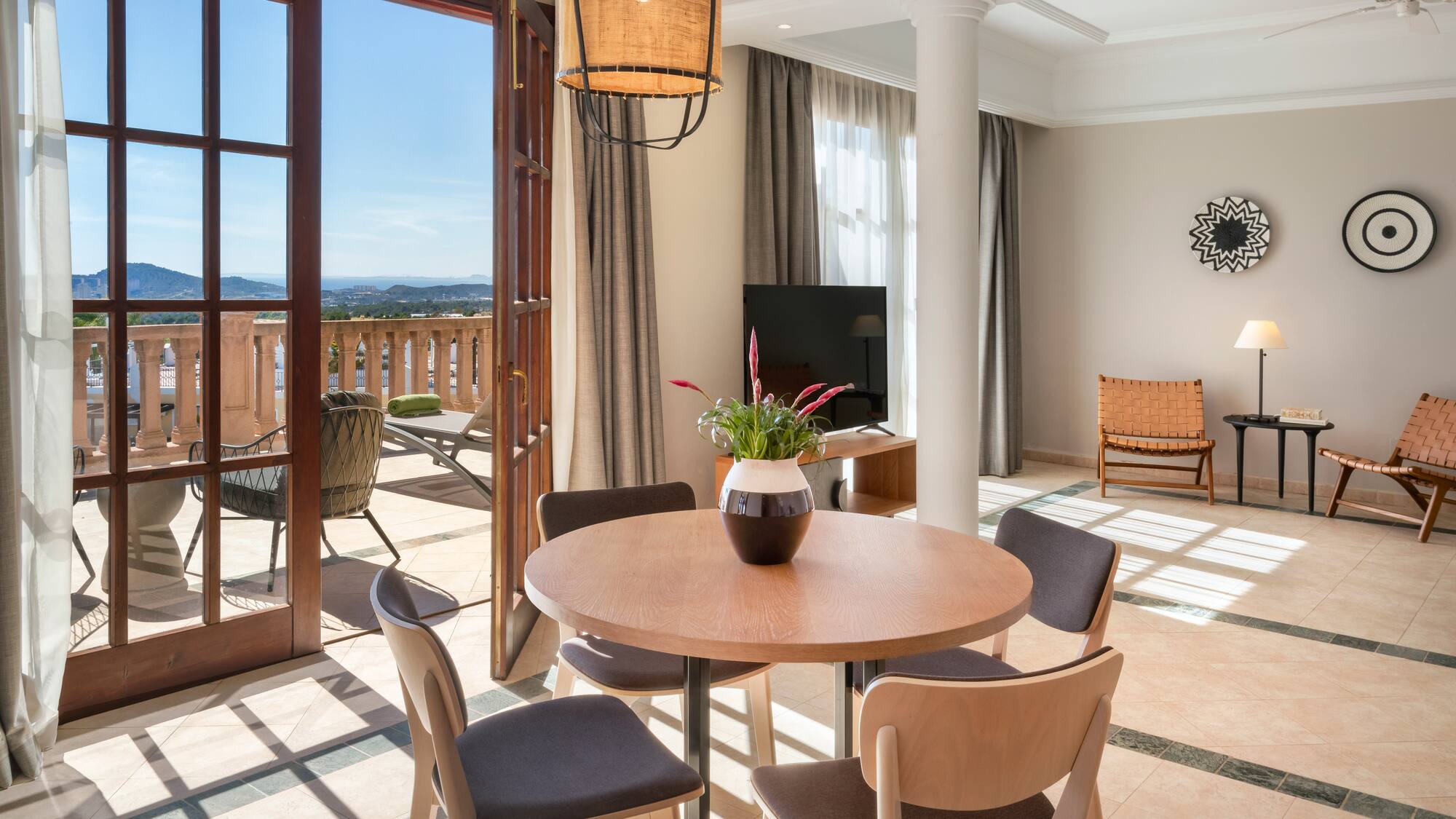 a room with a table and chairs