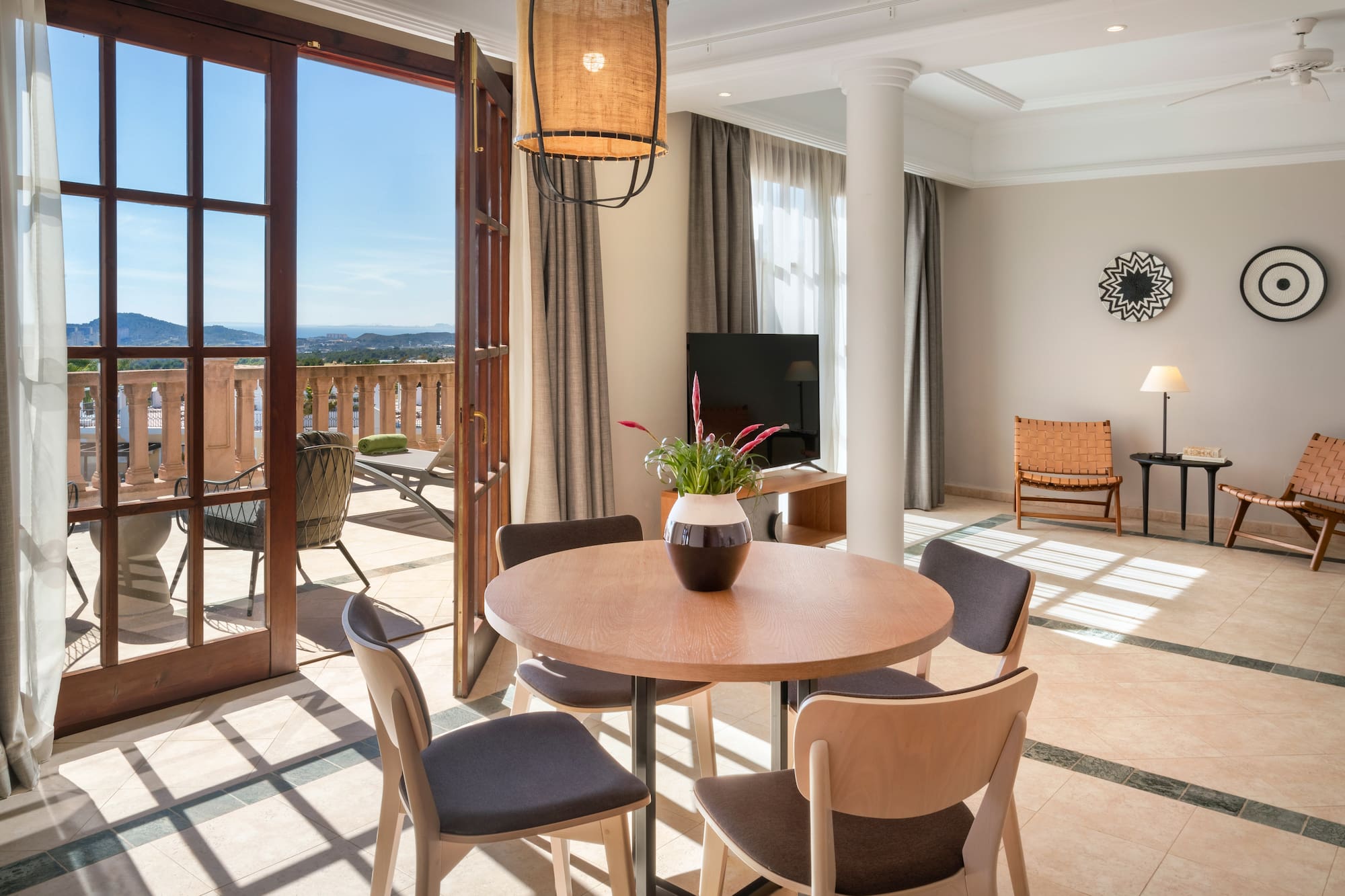 a room with a table and chairs