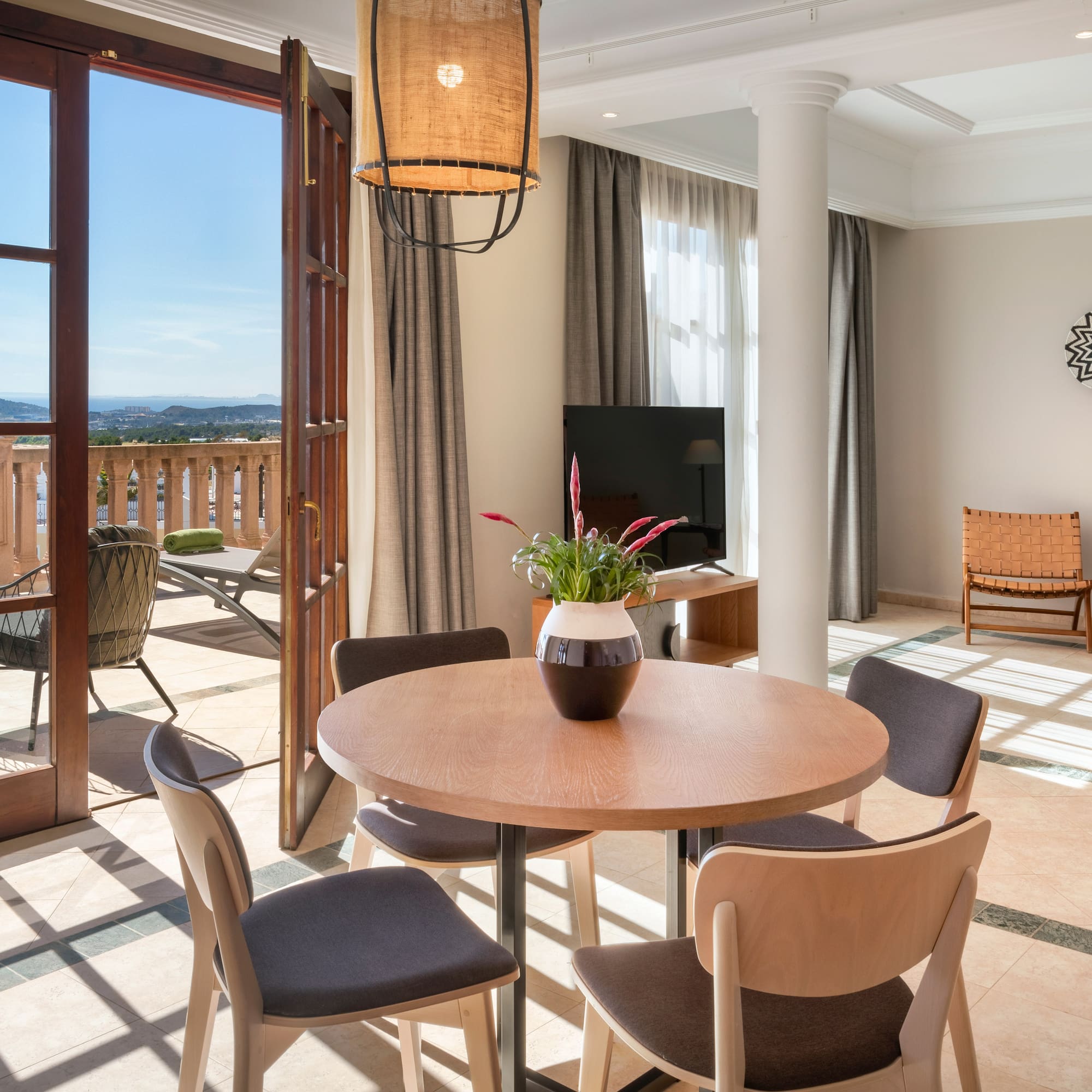 a room with a table and chairs