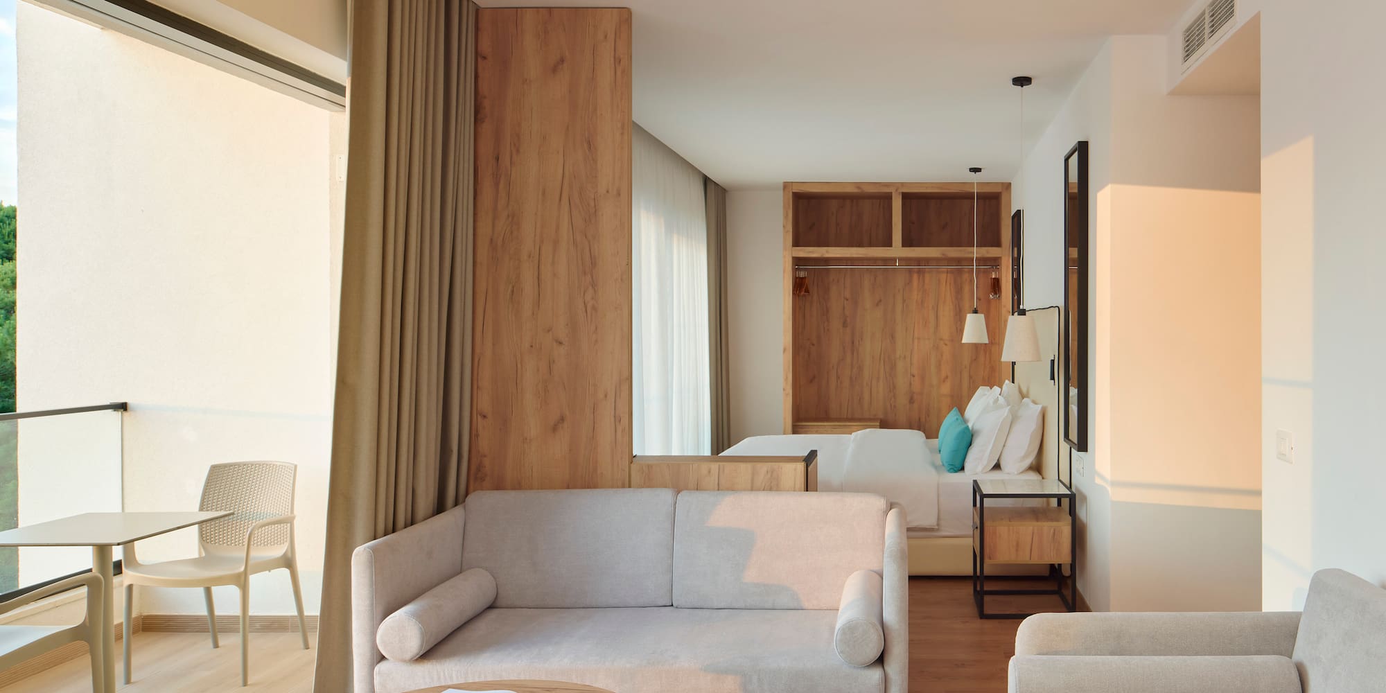 a room with a couch and a bed