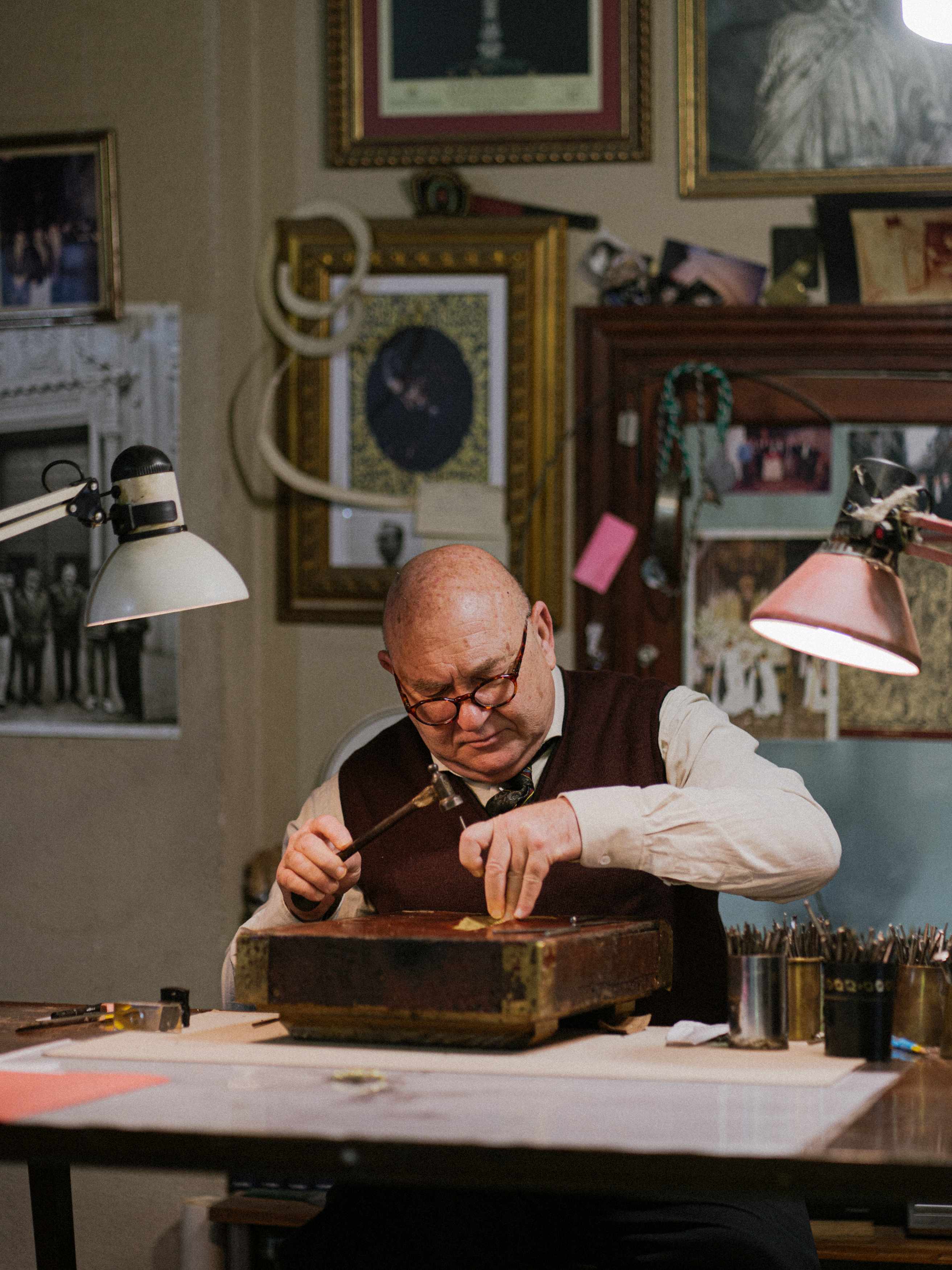 a man working on a piece of wood