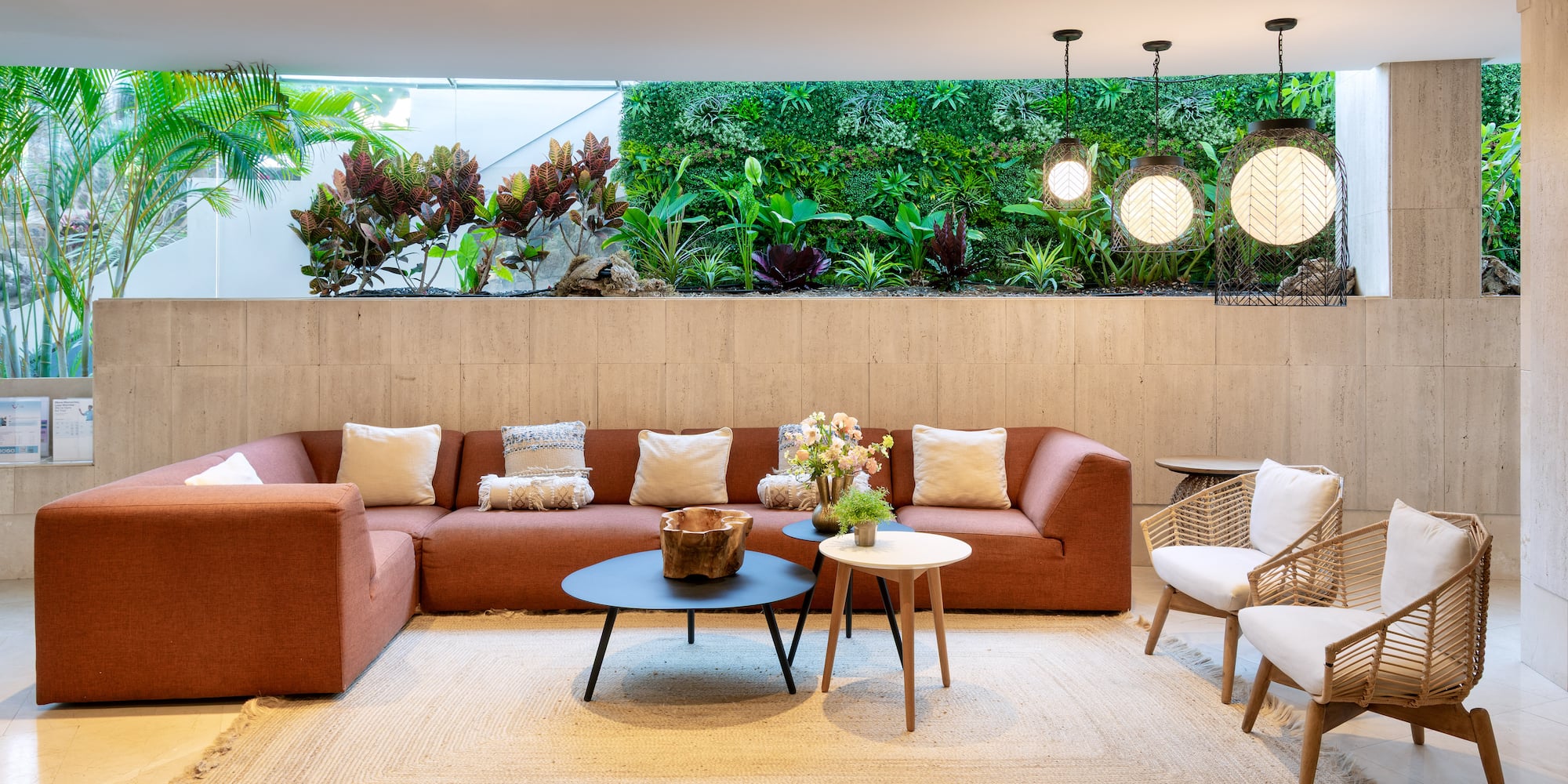 a living room with a couch and chairs