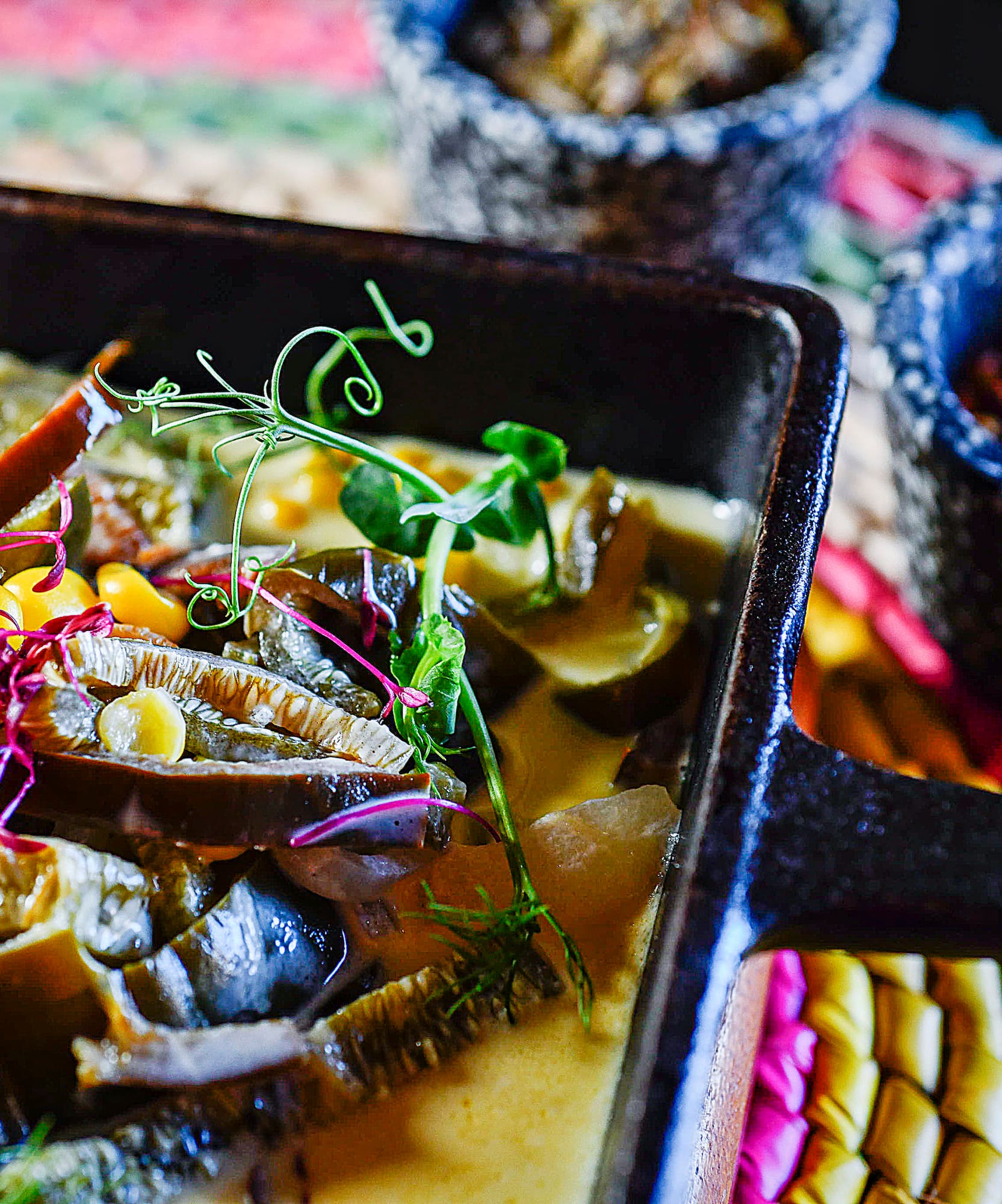 a pan of food with a few bowls of food