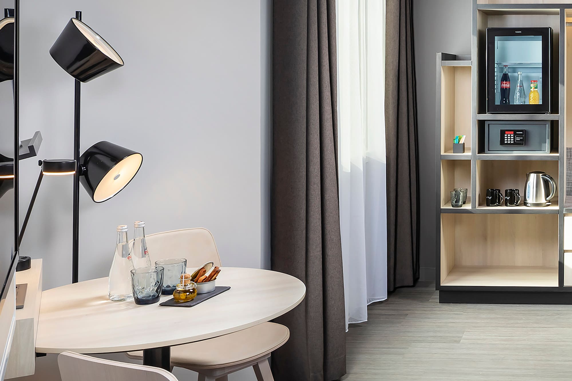 a room with a table and chairs