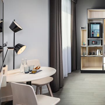 a room with a table and chairs