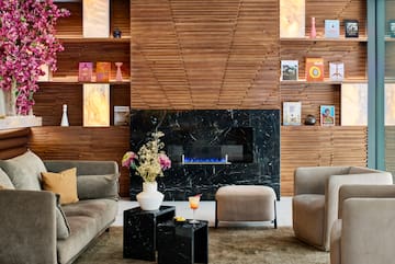 a room with a fireplace and furniture