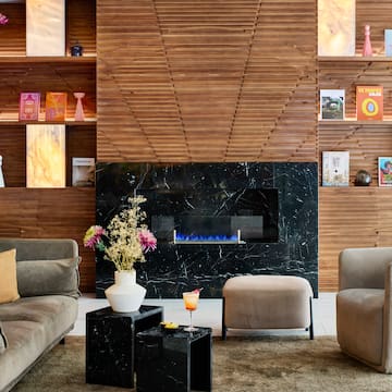 a room with a fireplace and furniture