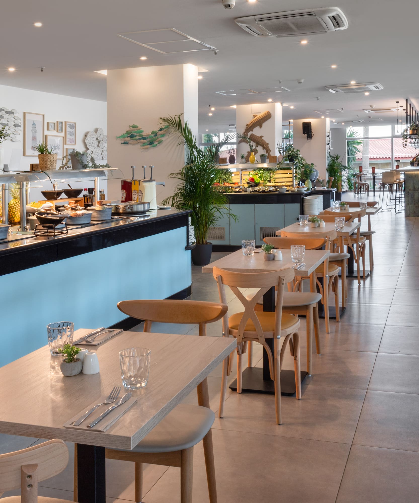 a restaurant with tables and chairs