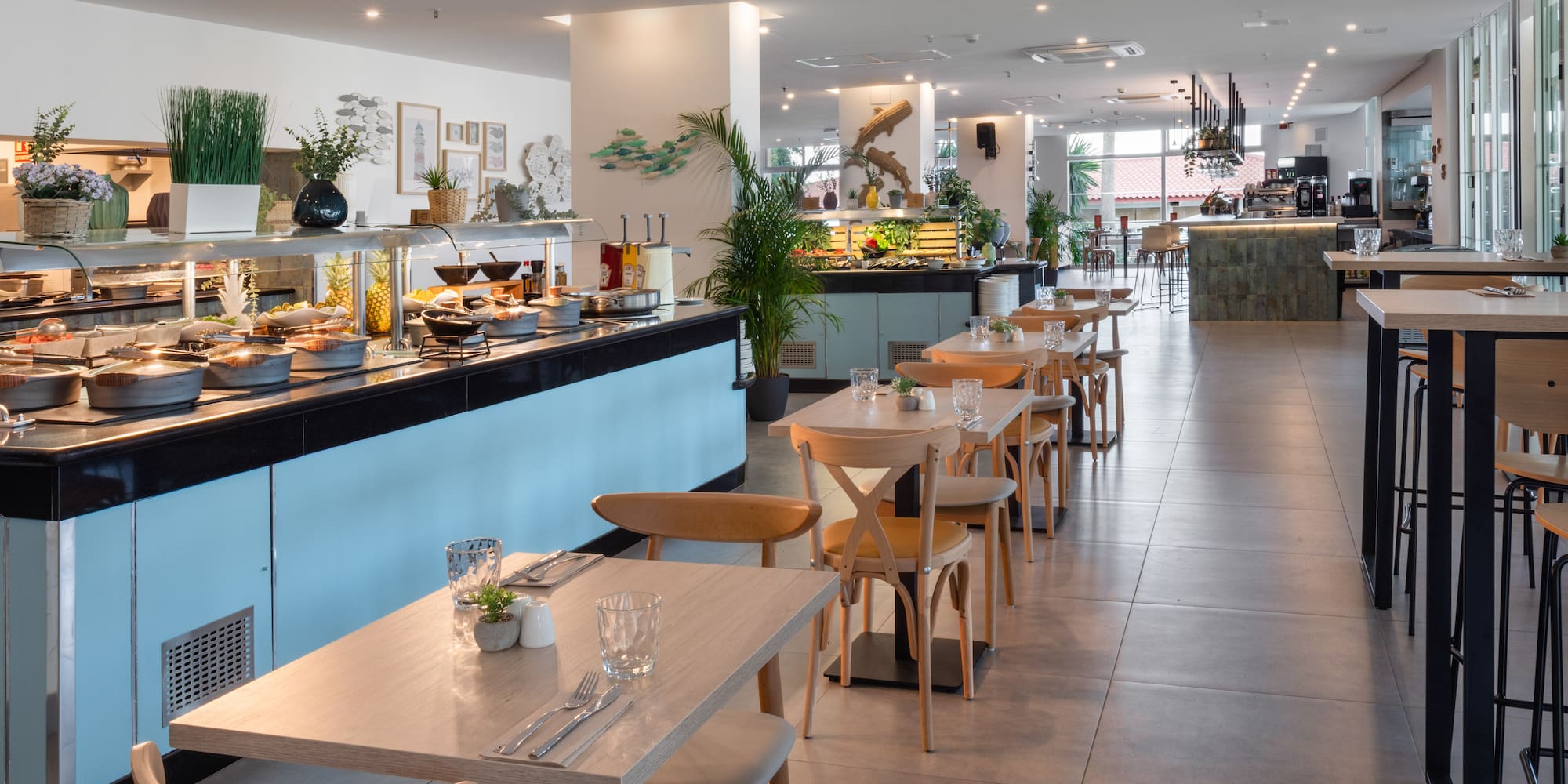 a restaurant with tables and chairs