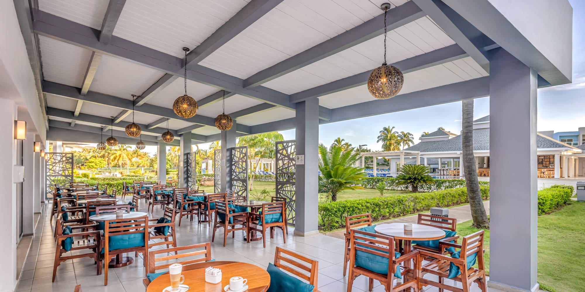a restaurant with tables and chairs