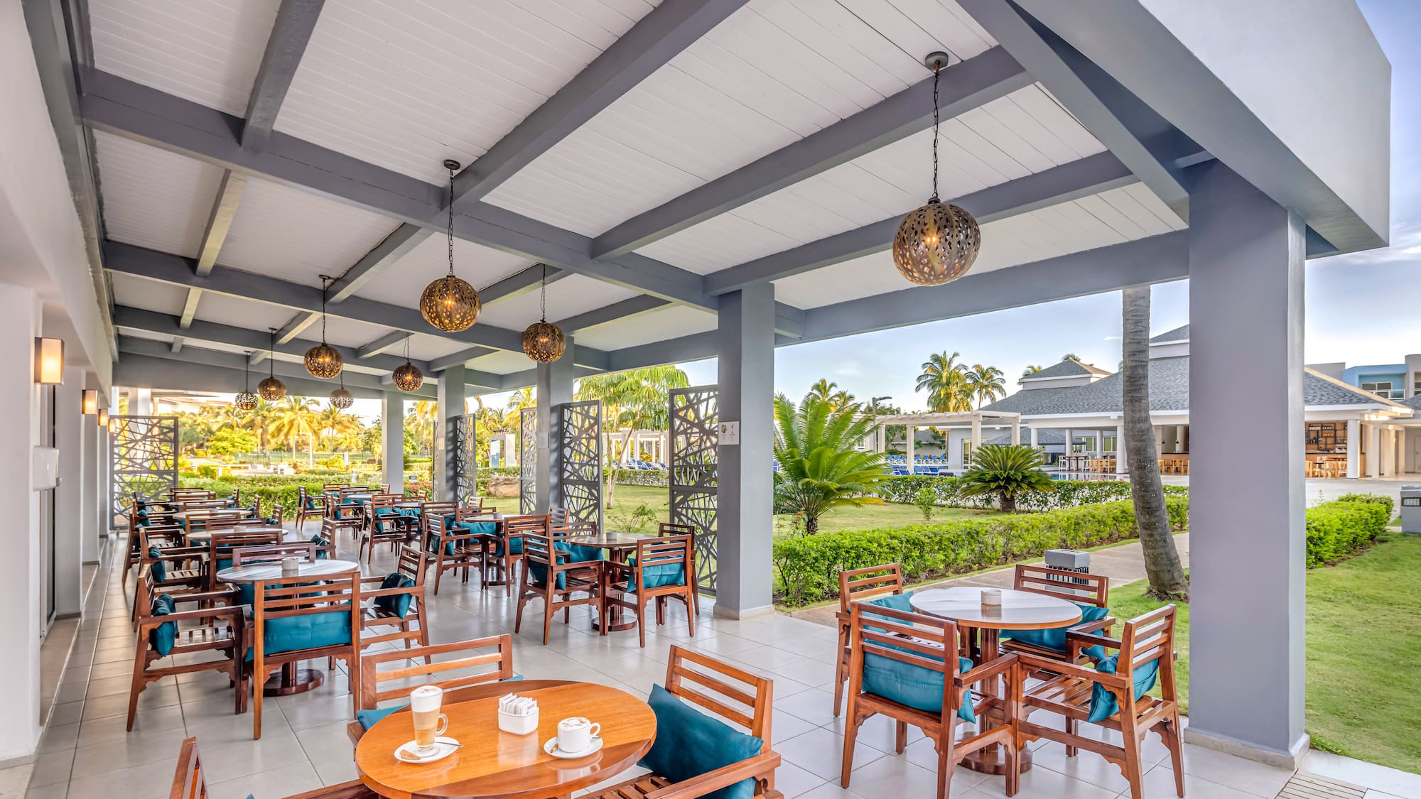 a restaurant with tables and chairs