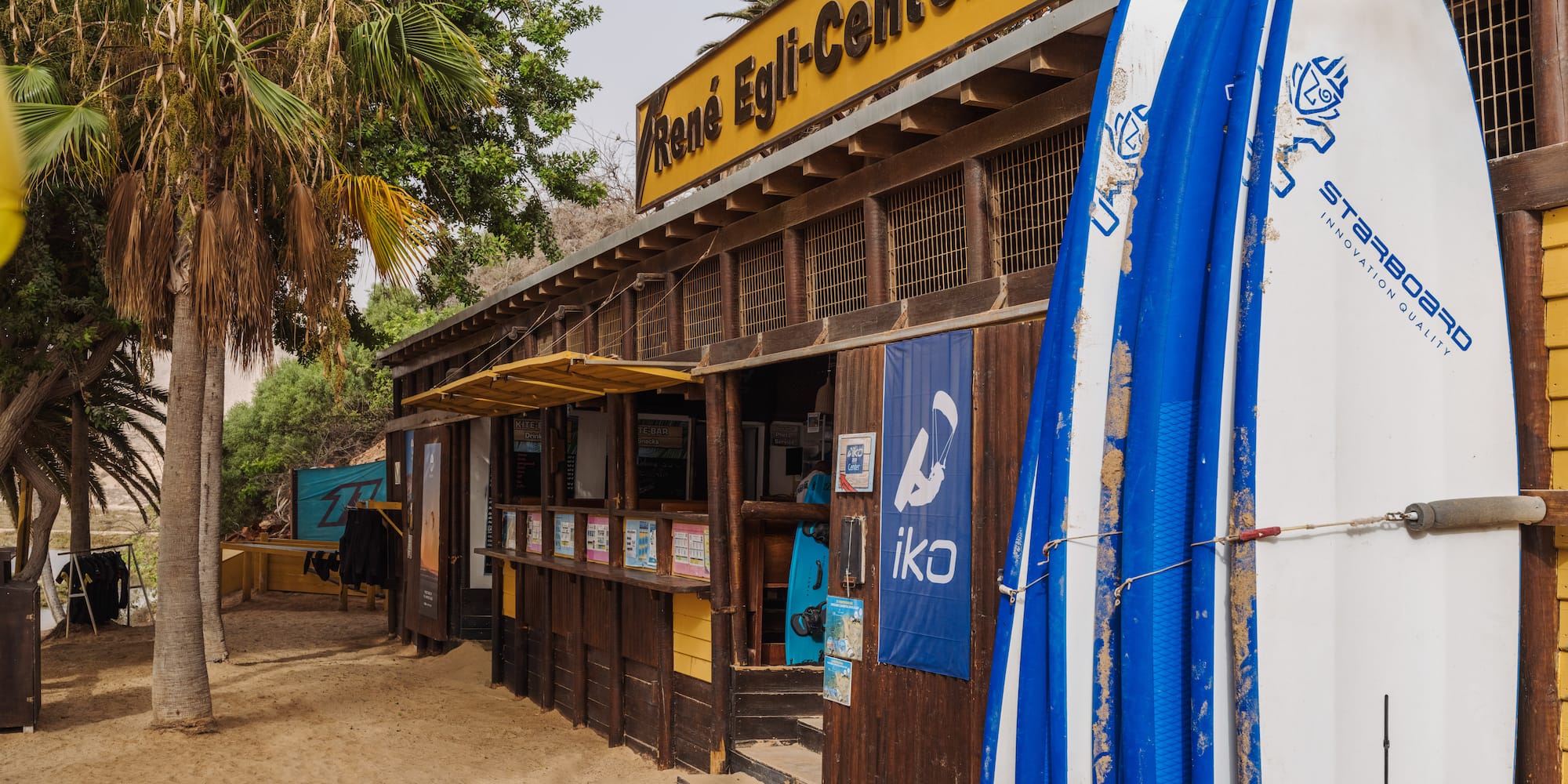 a surfboard leaning against a building