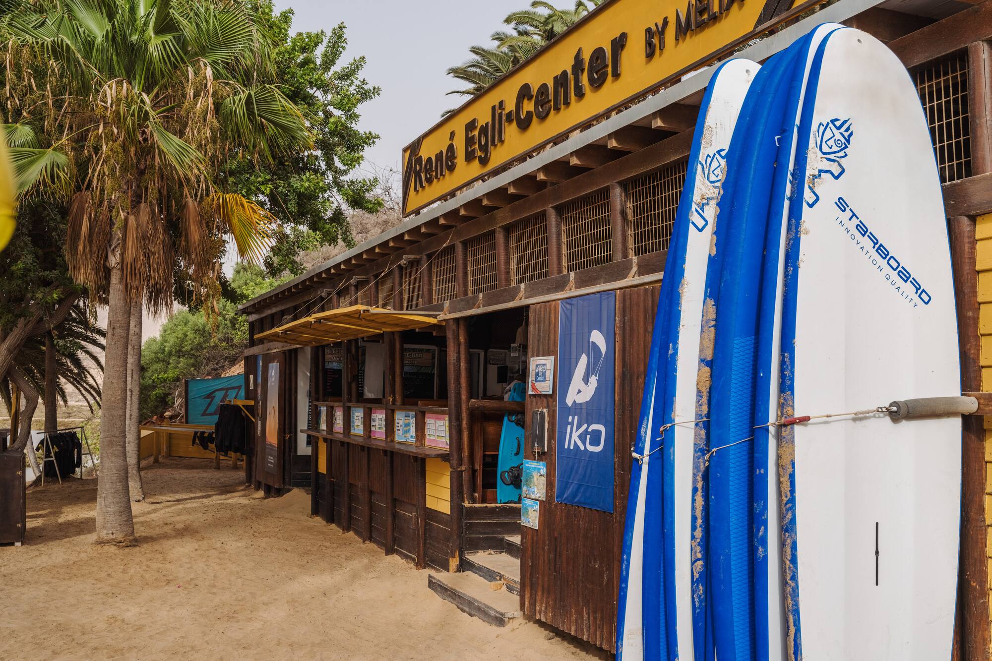 a surfboard leaning against a building