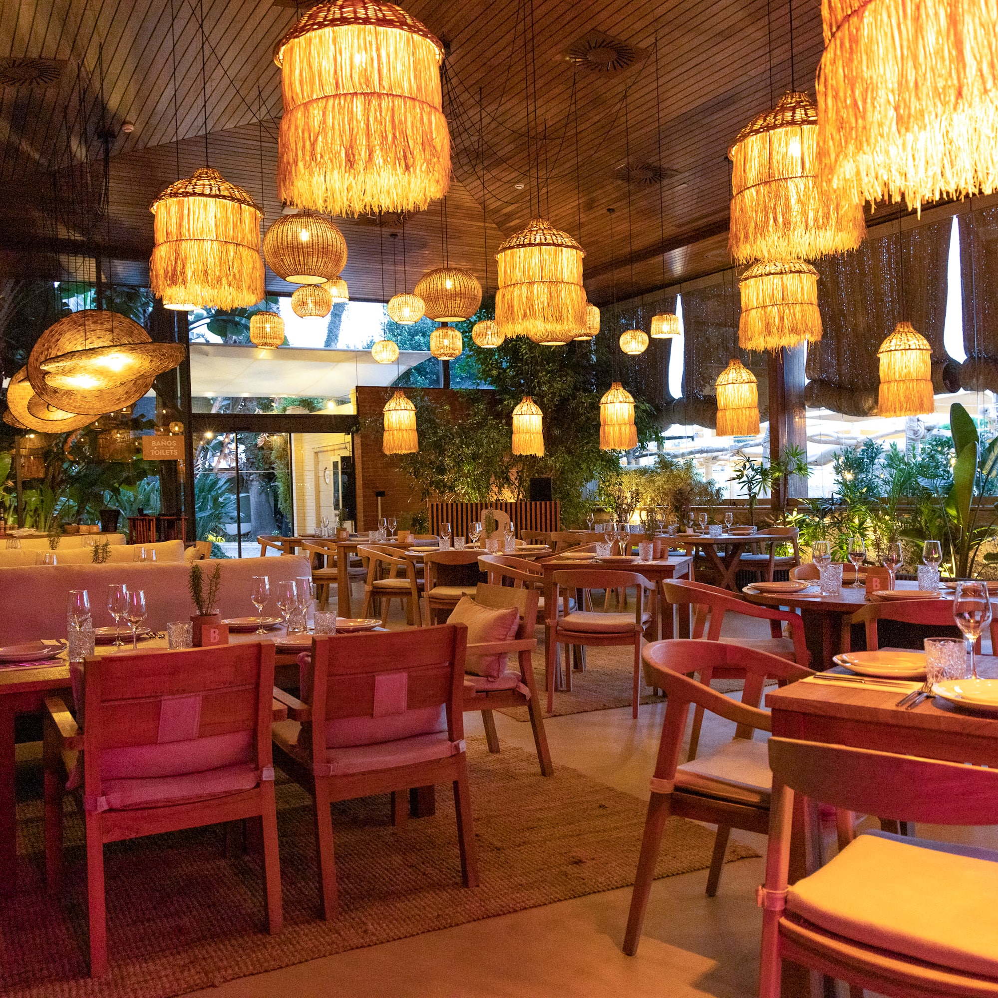 a restaurant with tables and chairs