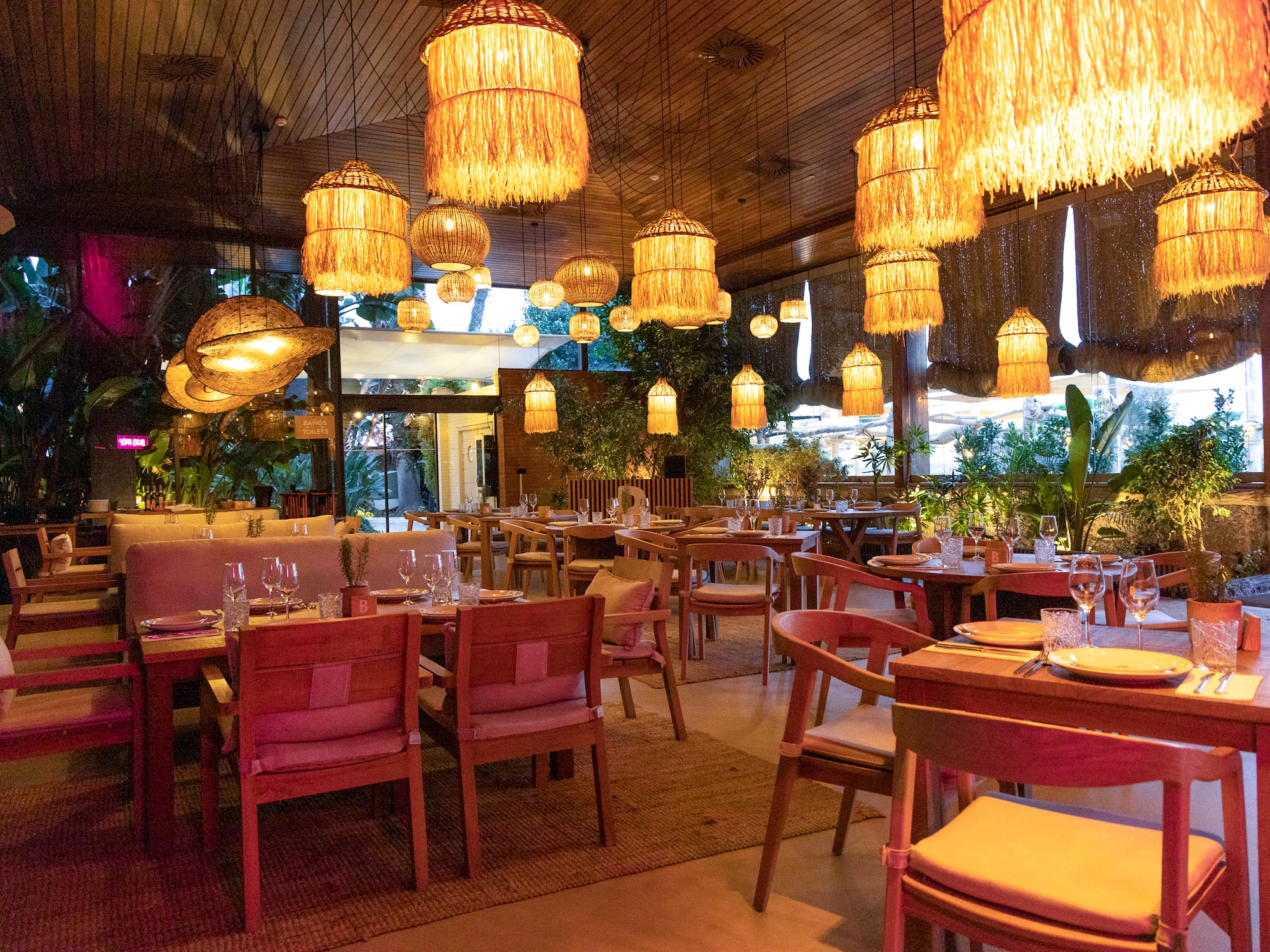 a restaurant with tables and chairs