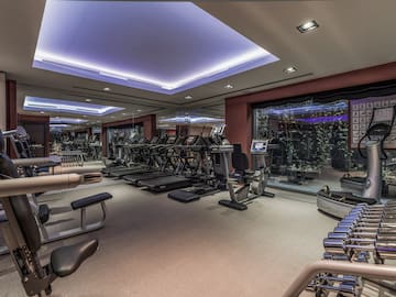 a large room with exercise equipment