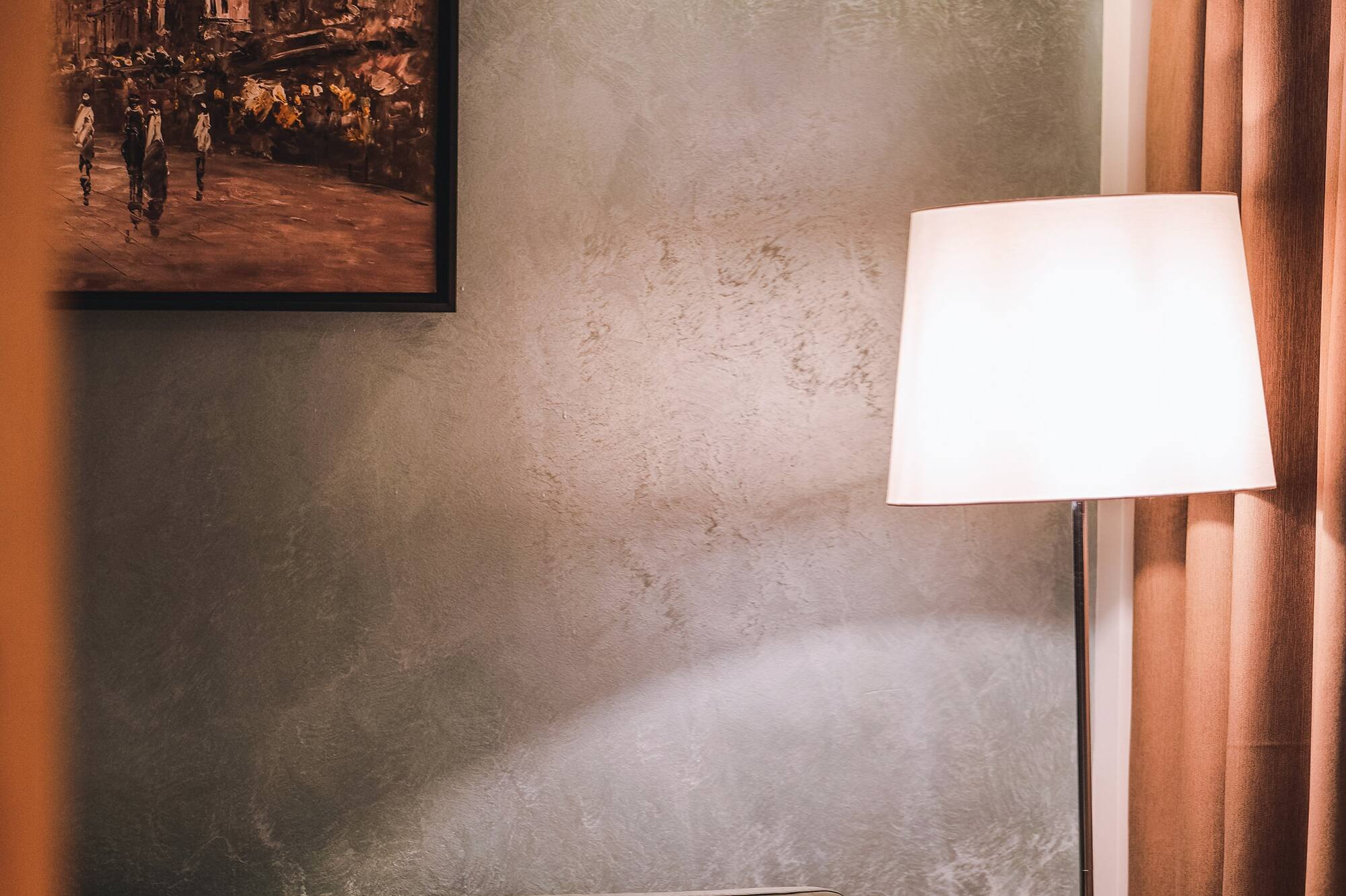 a lamp next to a chair