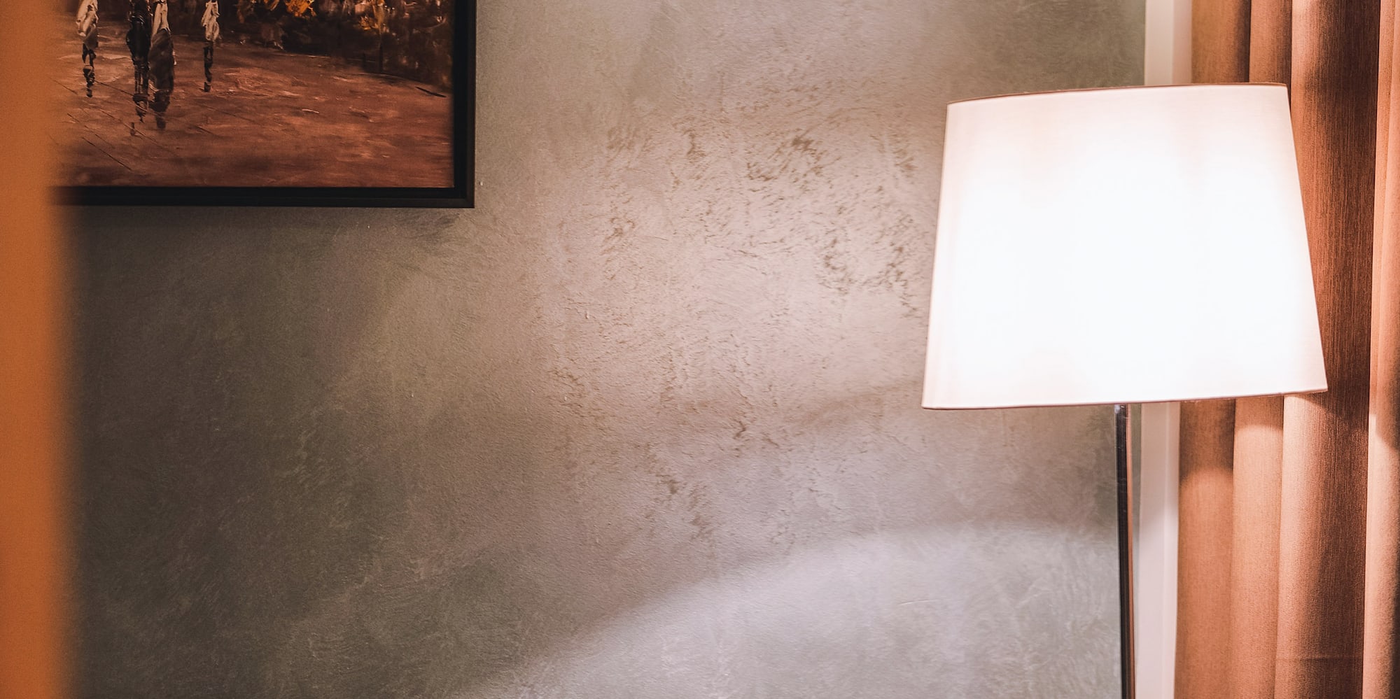 a lamp next to a chair