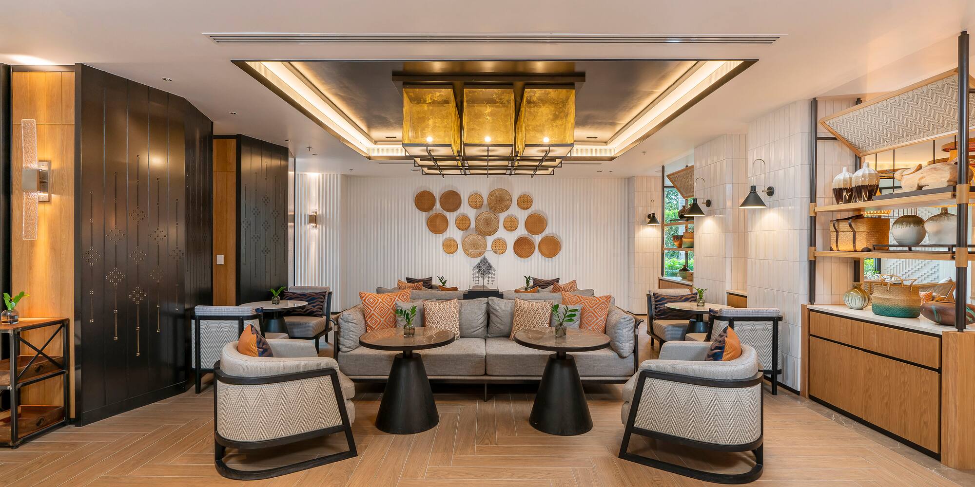 a room with a couch and tables