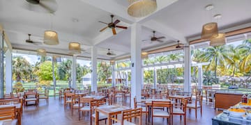 a room with tables and chairs