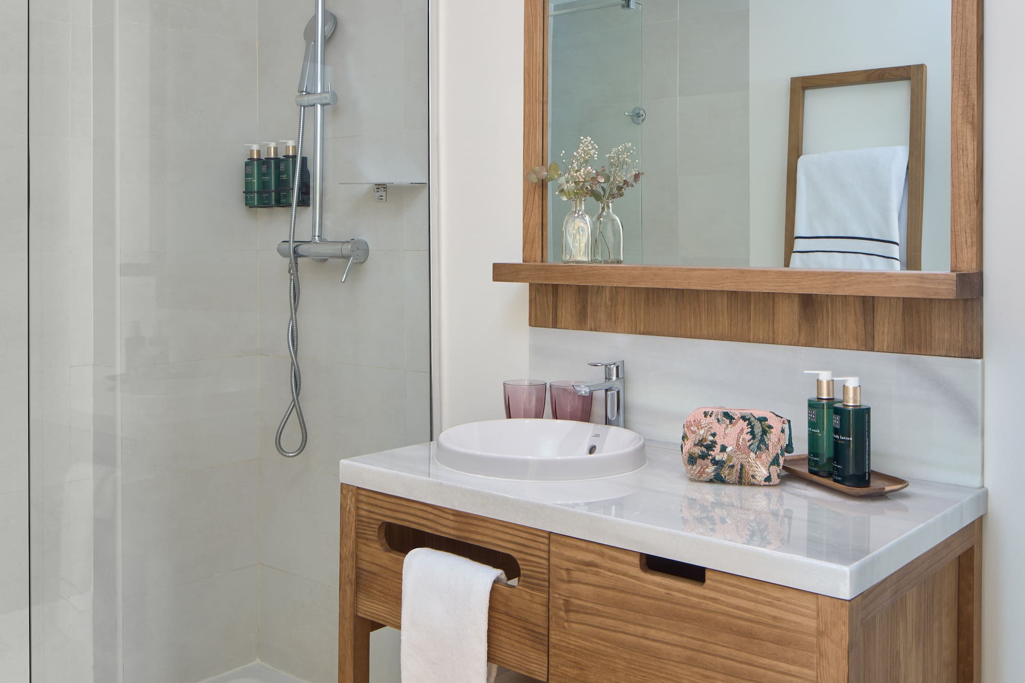 a bathroom with a mirror and a sink