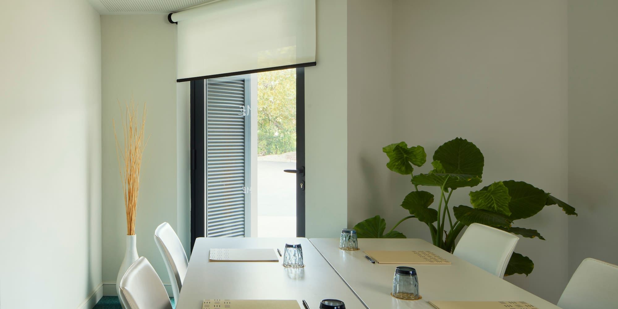 a room with a table and chairs