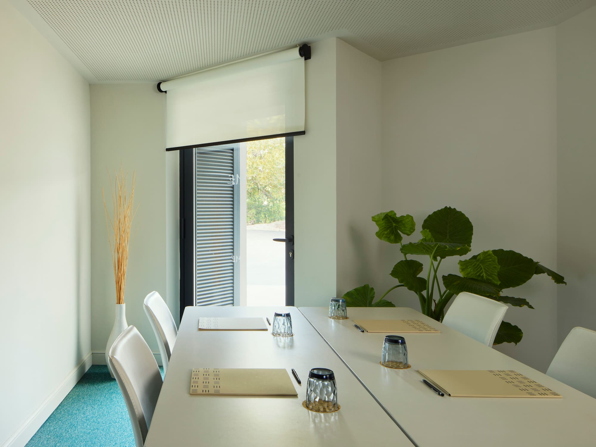 a room with a table and chairs