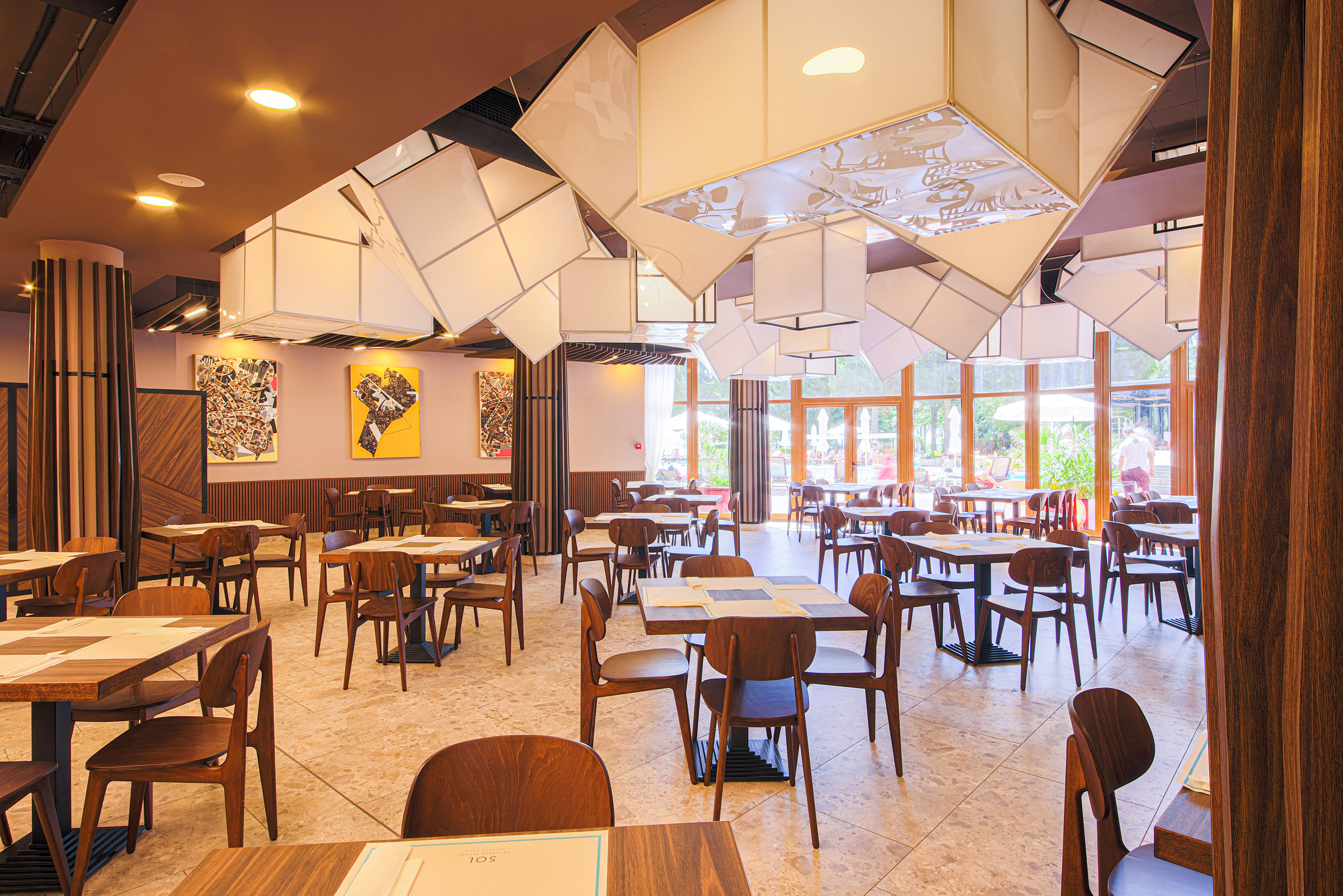 a room with tables and chairs