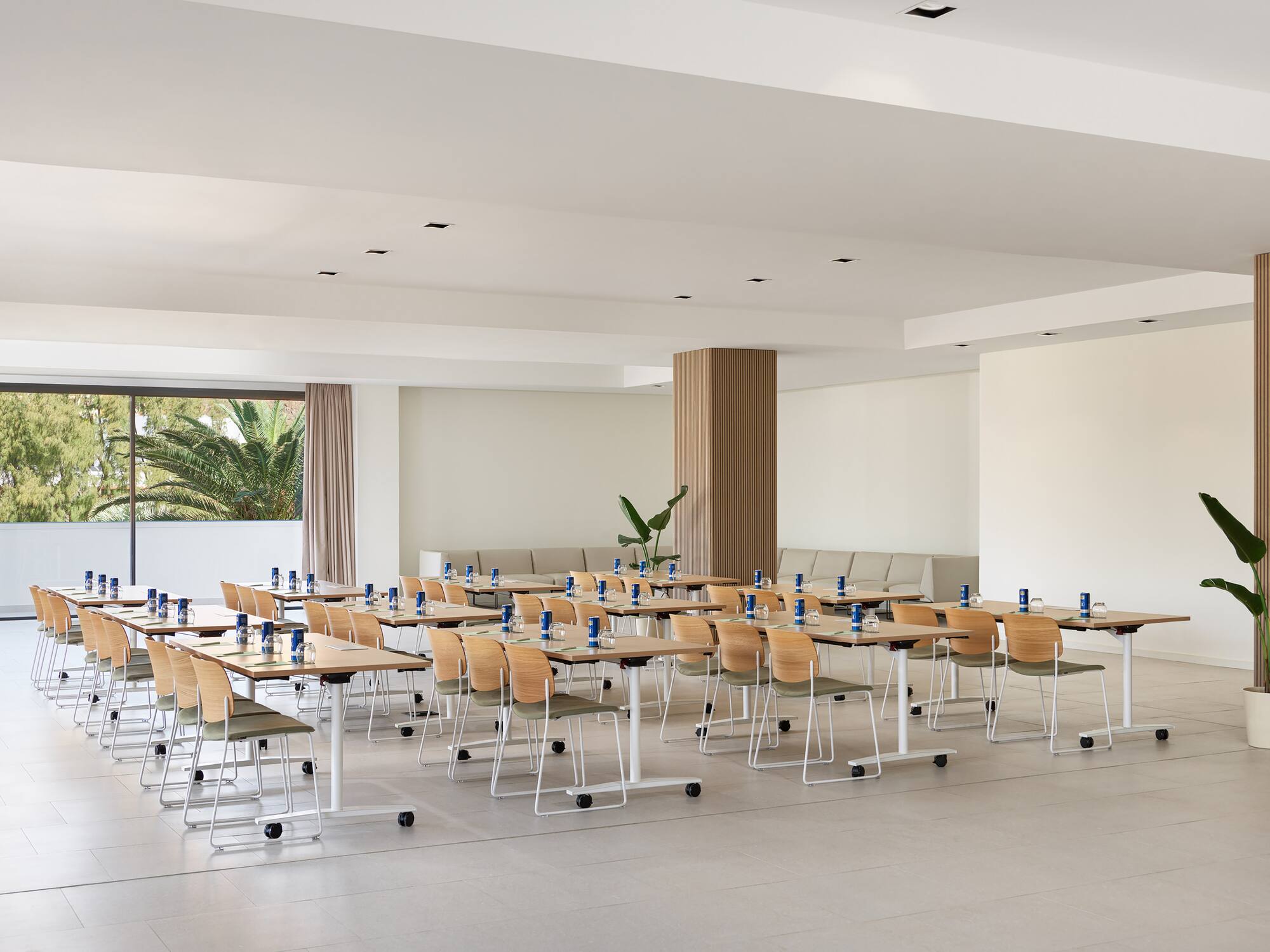 a room with tables and chairs 