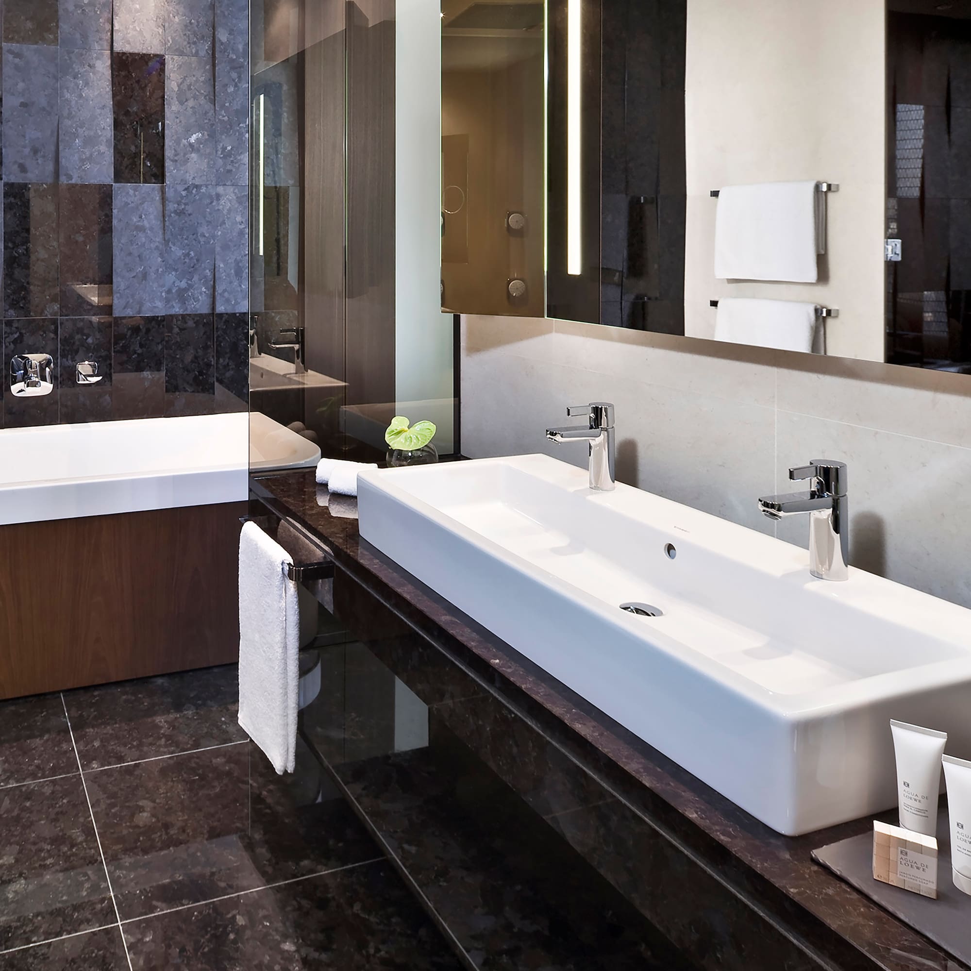 a bathroom with a sink and a tub