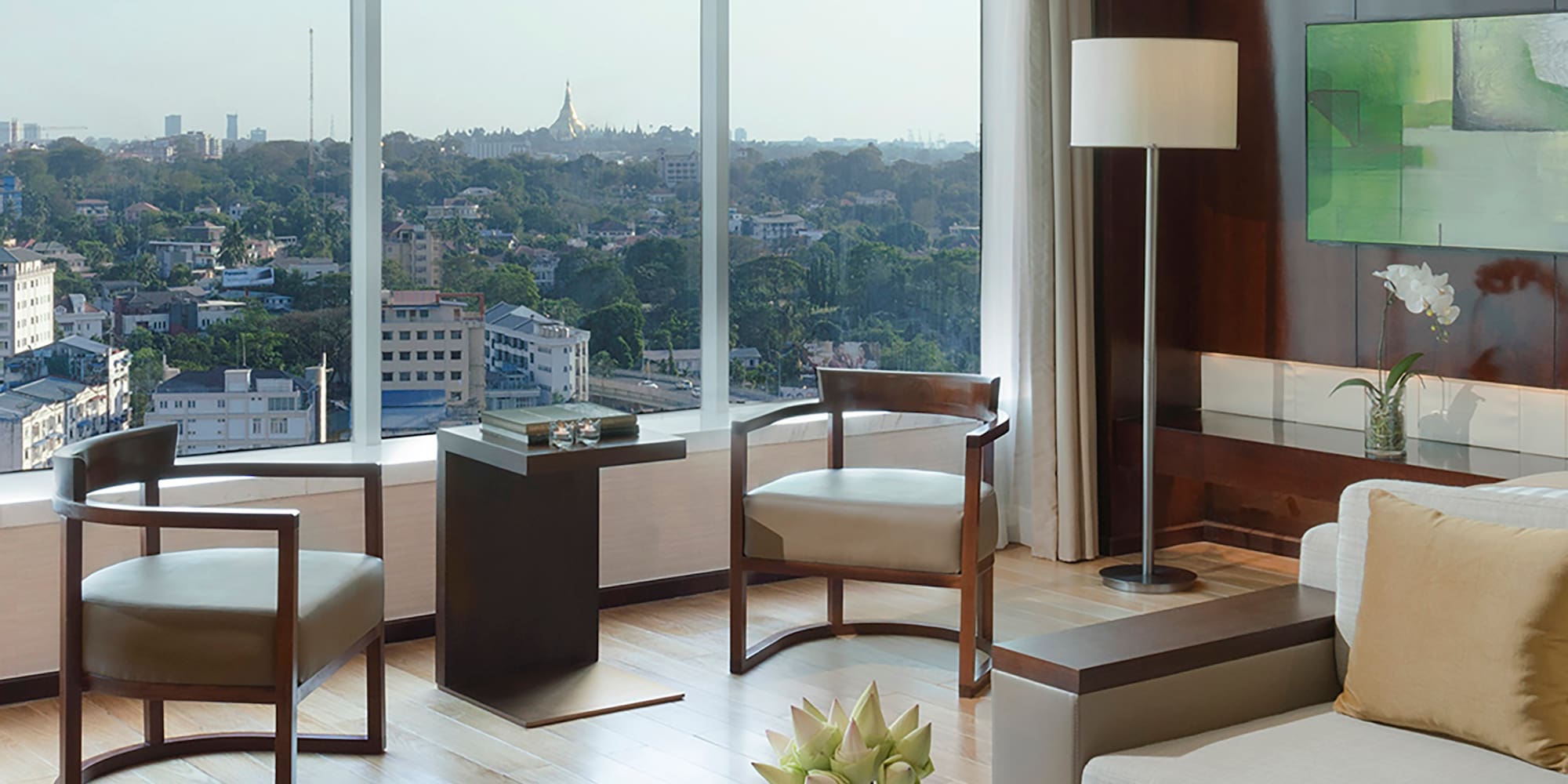 a living room with a view of a city