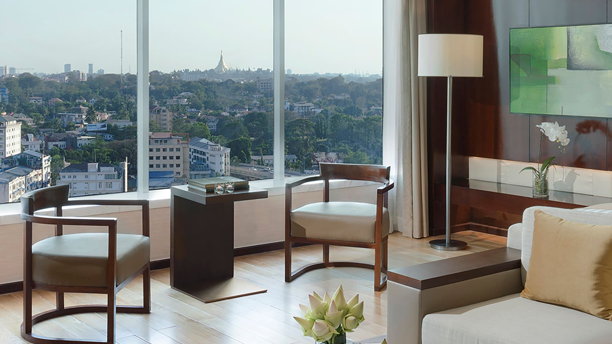 a living room with a view of a city