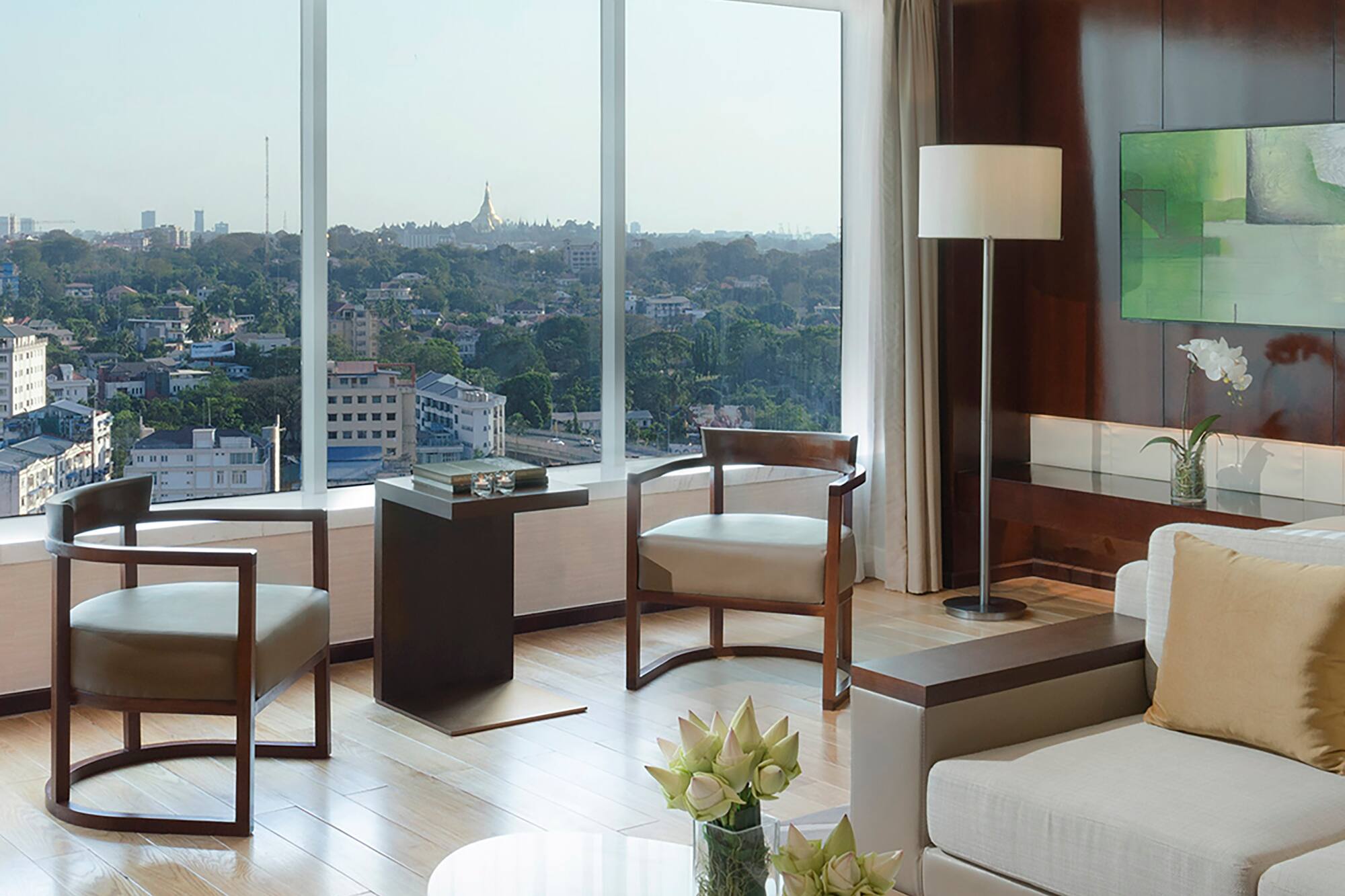 a living room with a view of a city
