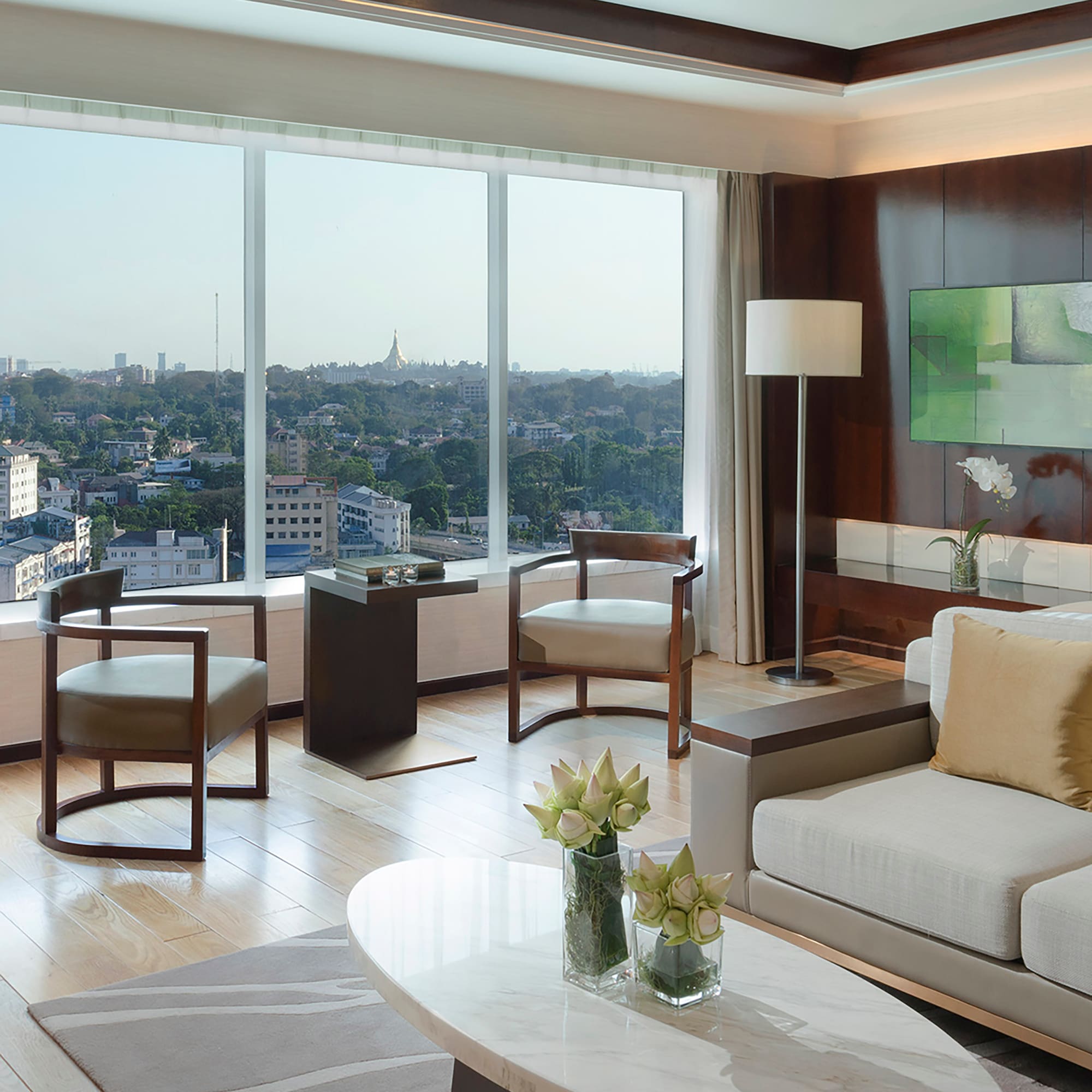a living room with a view of a city