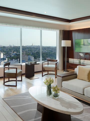 a living room with a view of a city