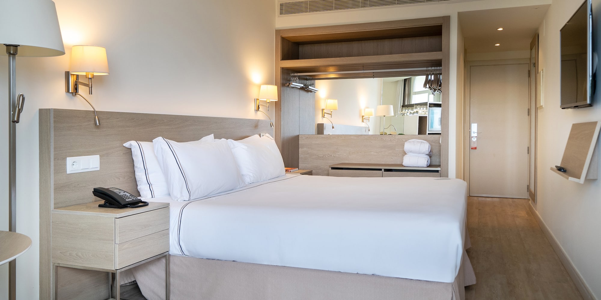 a bed in a hotel room