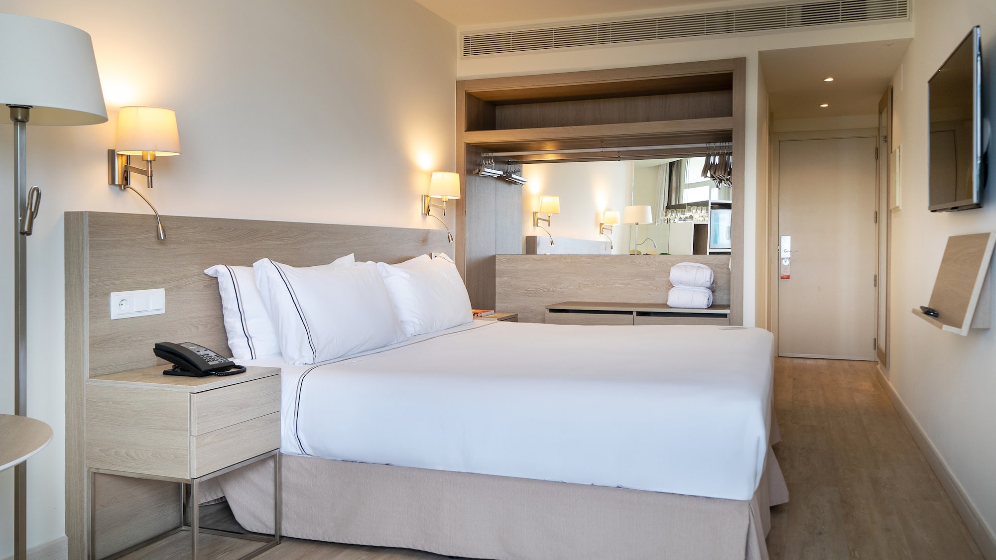 a bed in a hotel room